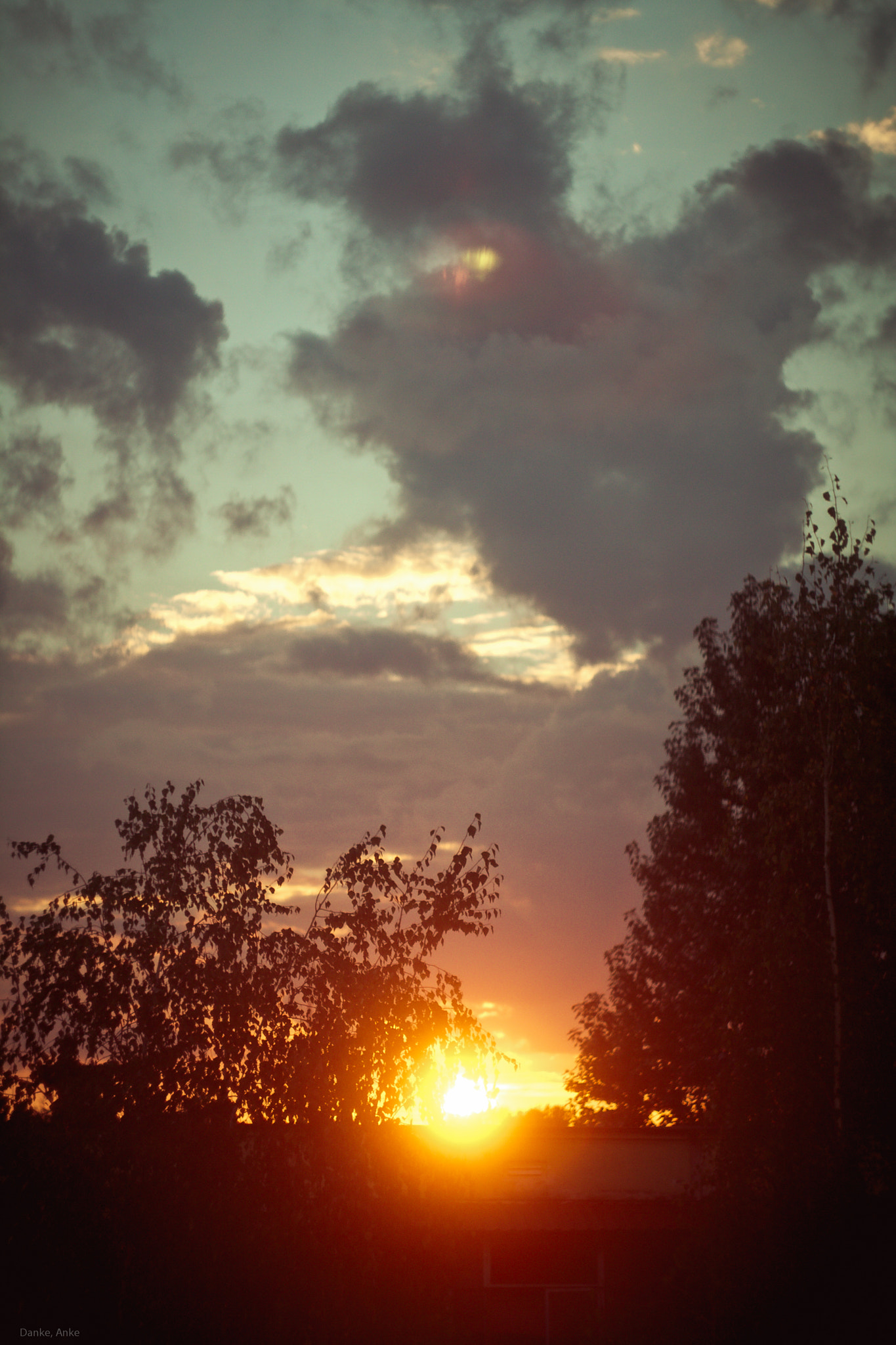 Canon EF 35-80mm f/4-5.6 sample photo. Town sunset photography