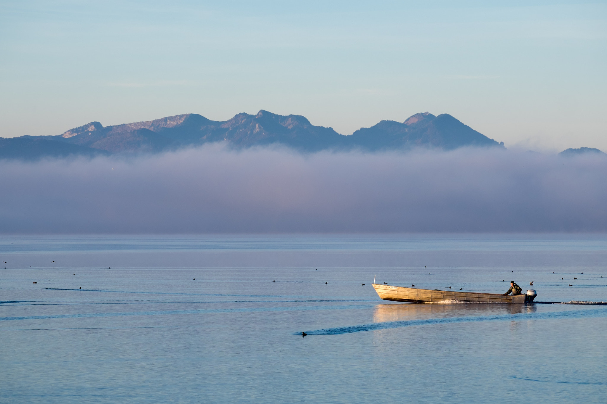 Fujifilm XF 100-400mm F4.5-5.6 R LM OIS WR sample photo. Fisherman in the morning sun photography