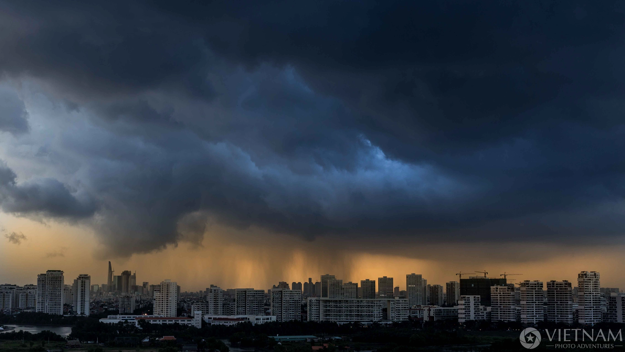 ZEISS Planar T* 50mm F1.4 sample photo. Monsoon downpour on saigon photography