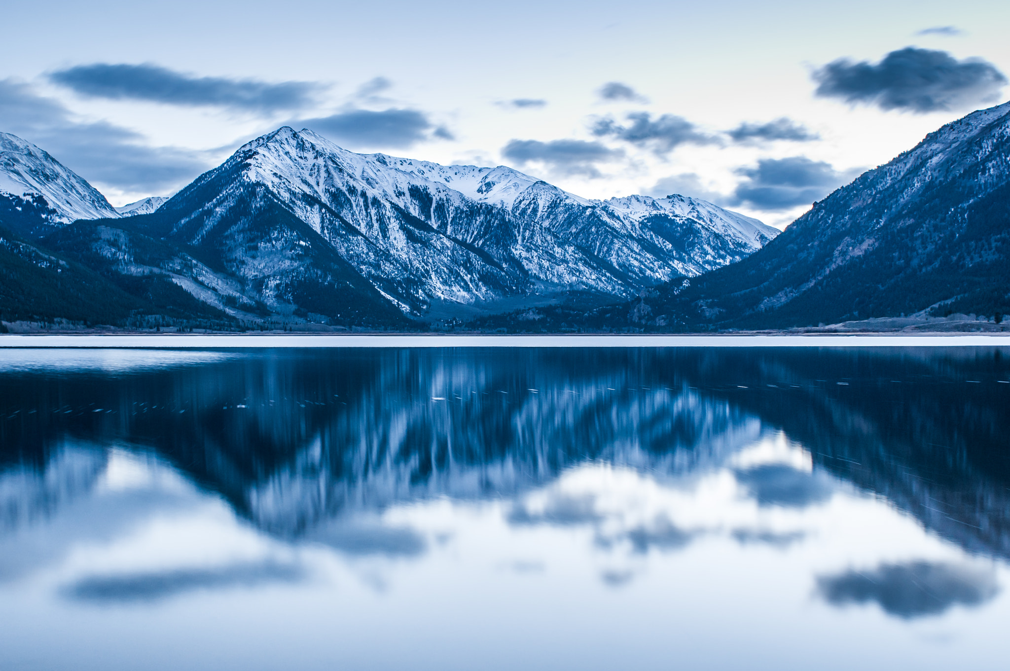 Nikon D300 + AF Nikkor 24mm f/2.8 sample photo. A still lake in the winter time photography