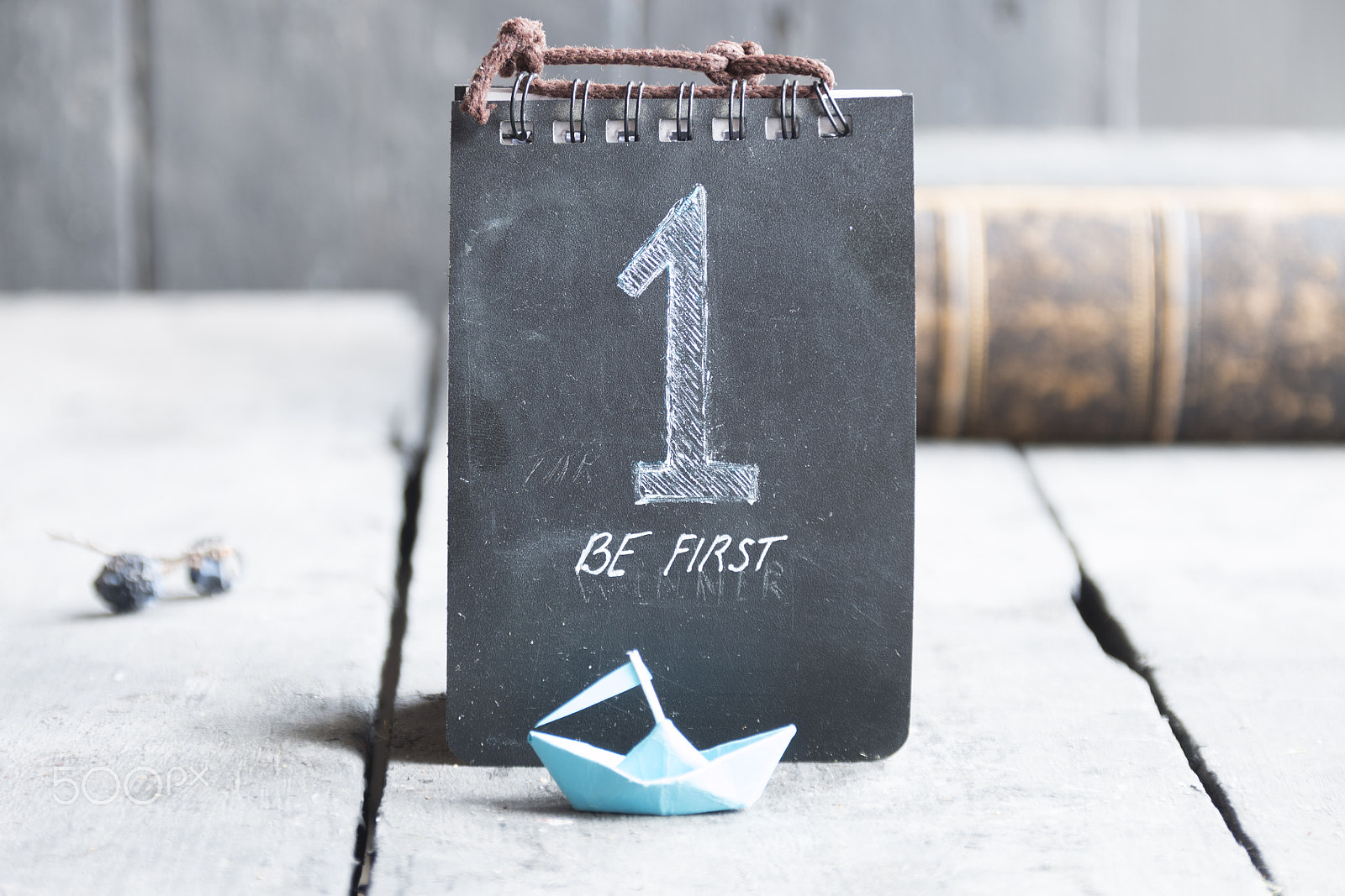 Sigma 18-200mm f/3.5-6.3 DC OS sample photo. Be first, leader idea. paper boat and the number one. photography