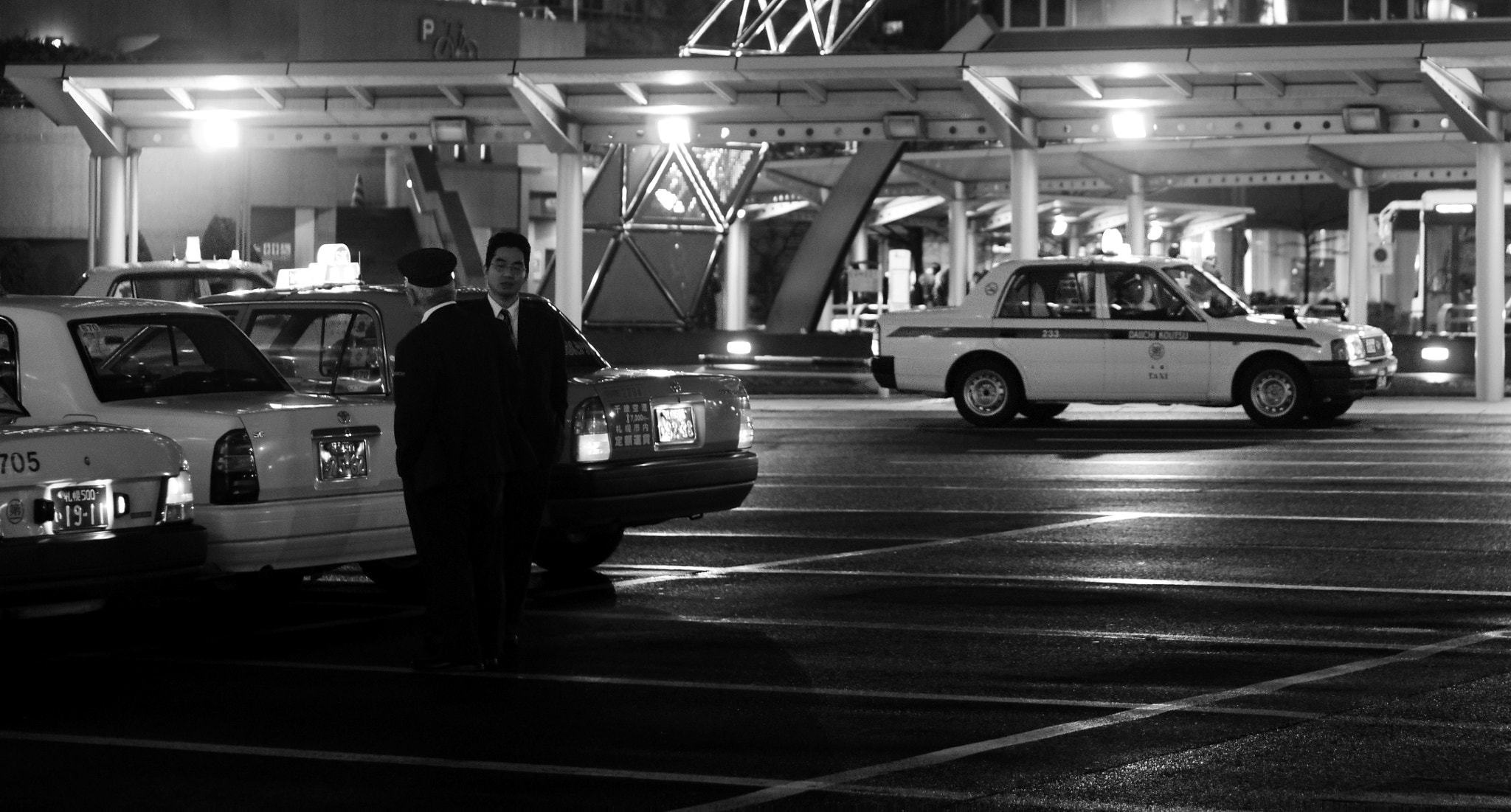 Sony E 50mm F1.8 OSS sample photo. Taxi crew photography