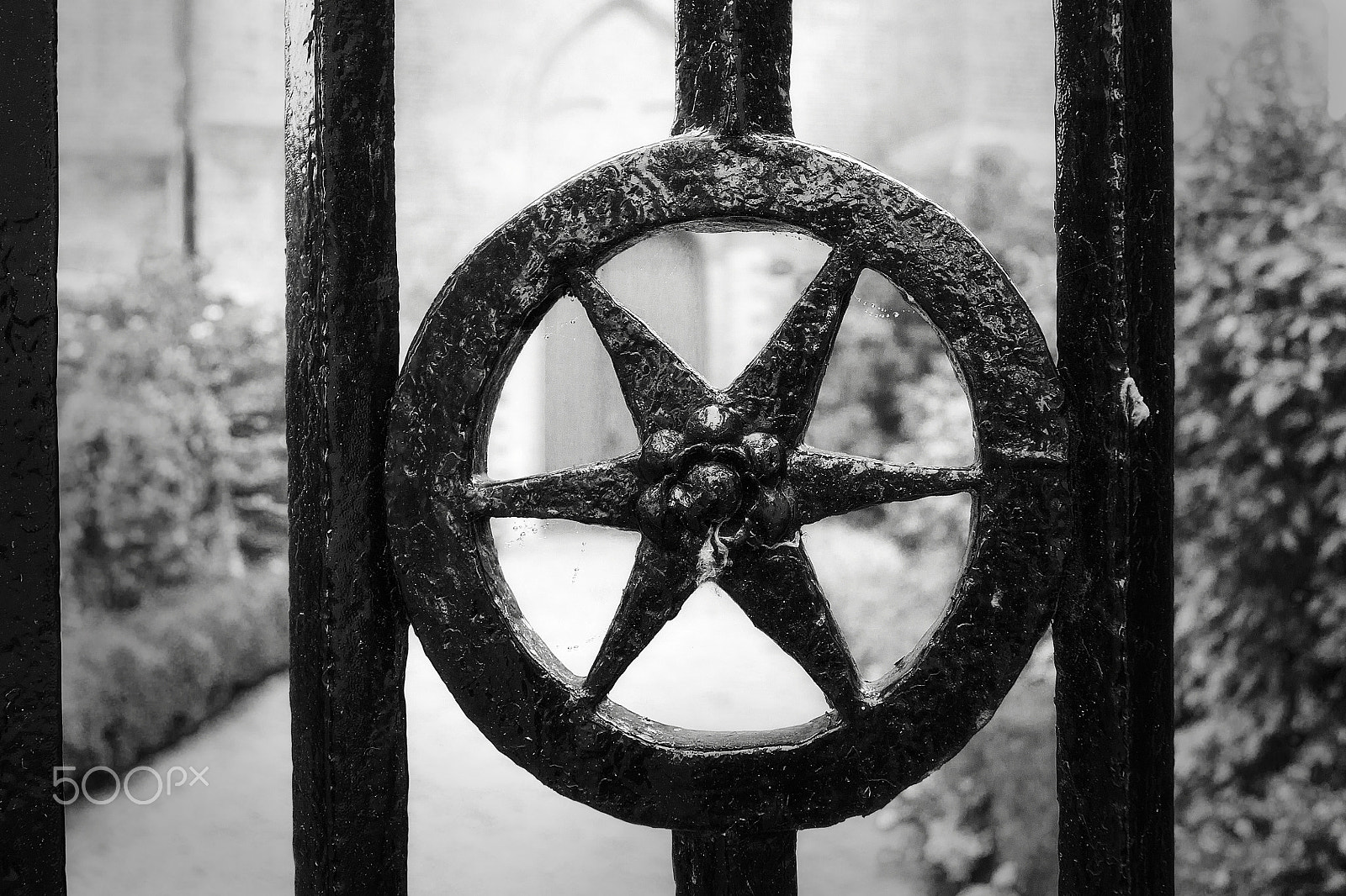 Sony Alpha DSLR-A500 sample photo. Cast iron gate at church photography