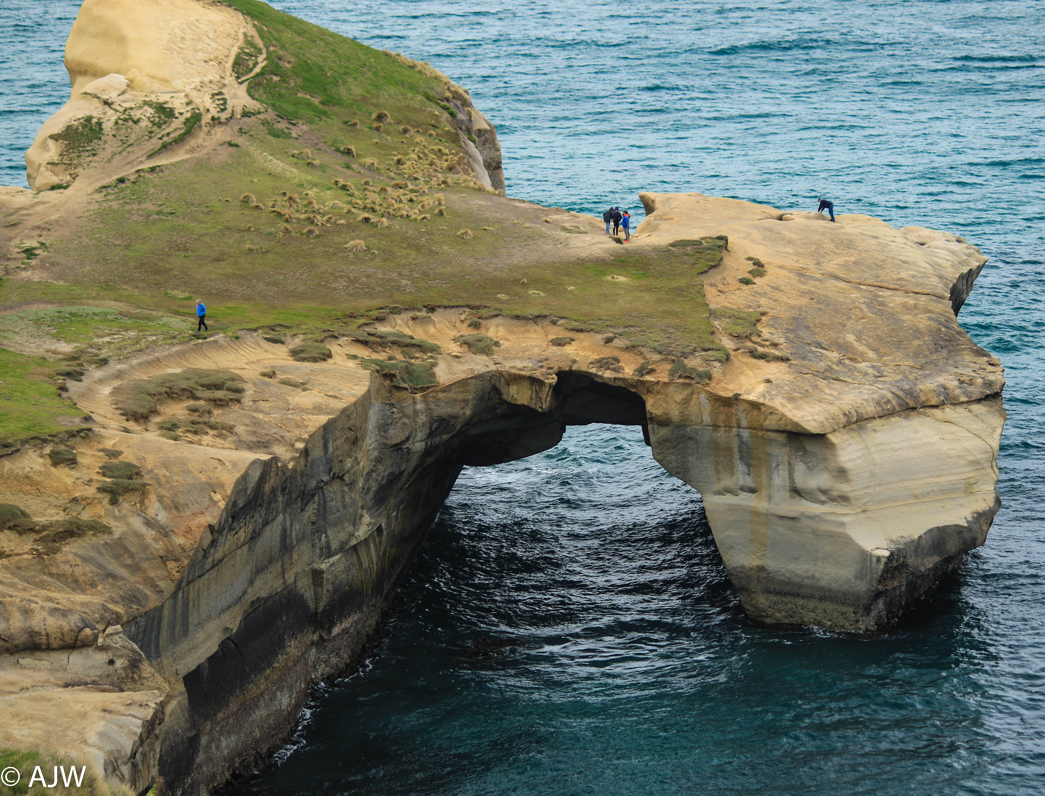 Canon EF-S 55-250mm F4-5.6 IS II sample photo. Tunnel beach rock formations photography