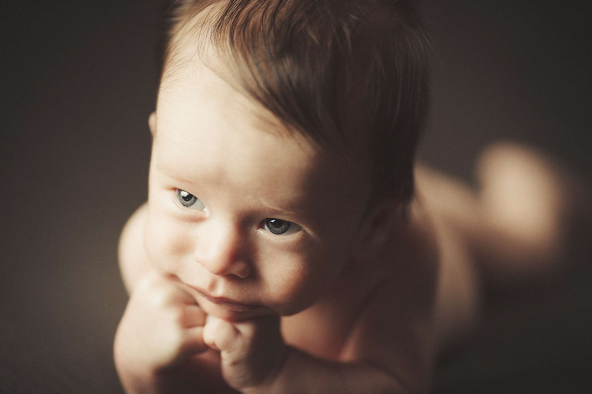 Canon EOS 5D Mark IV + Canon EF 135mm F2L USM sample photo. Pondering baby photography