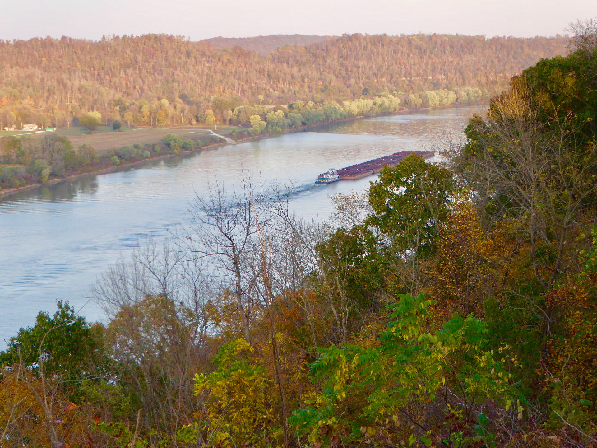 Panasonic Lumix DMC-ZS50 (Lumix DMC-TZ70) sample photo. A river barge heading downstream on the ohio river in southern indiana. fall has arrived. photography