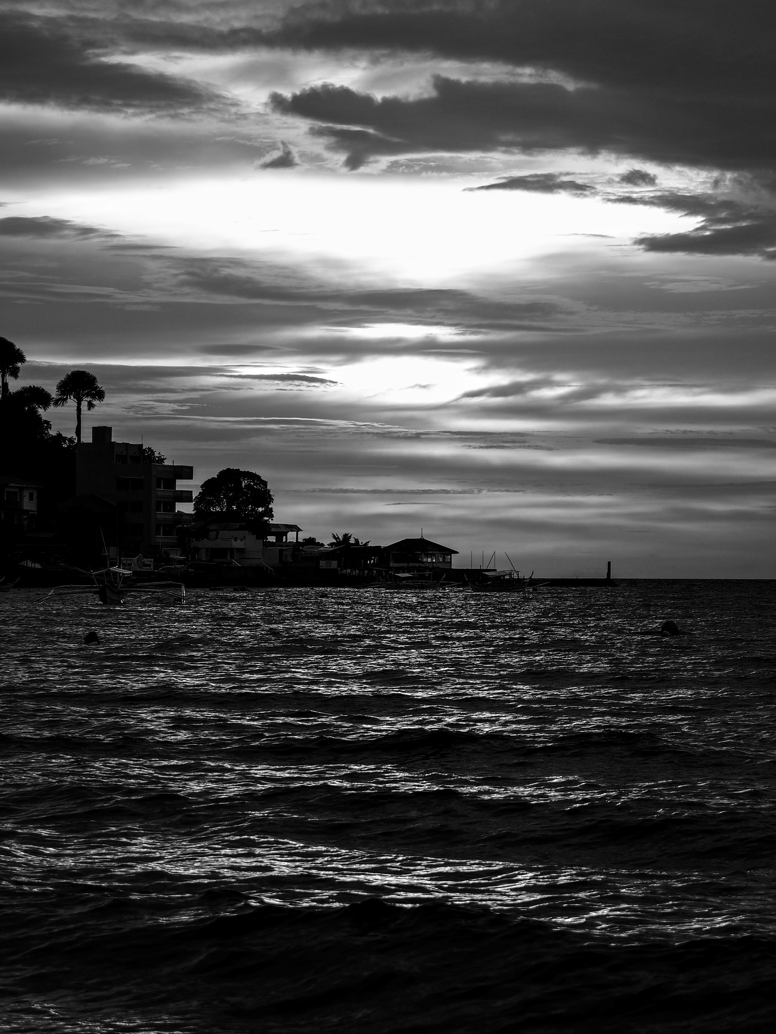 Olympus OM-D E-M10 + Olympus M.Zuiko Digital ED 40-150mm F2.8 Pro sample photo. There's just something magical about bnw sunsets by the beach  photography
