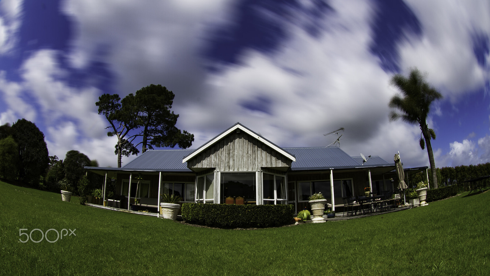 Canon EF 8-15mm F4L Fisheye USM sample photo. Racing clouds photography