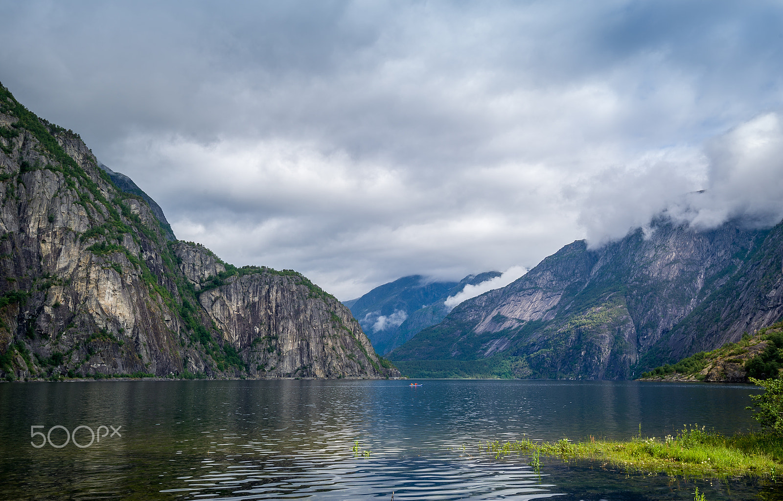 Nikon D3S sample photo. Scenic norway fjord landscape and kayak on the water. eidfjord. photography
