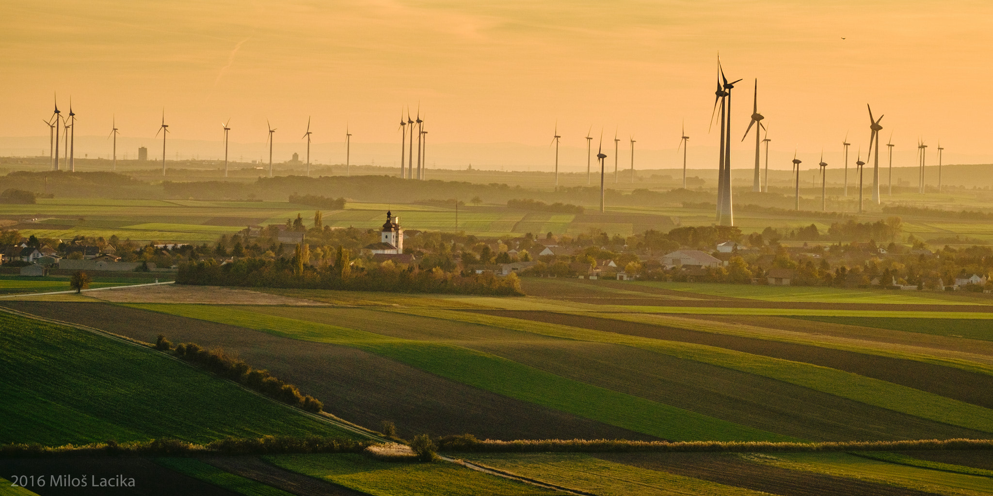 Fujifilm XF 55-200mm F3.5-4.8 R LM OIS sample photo. Air powerplants in sunset photography