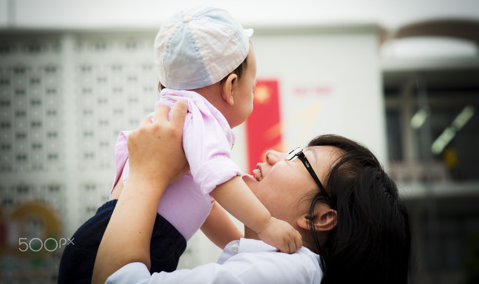 Nikon D90 + Sigma 85mm F1.4 EX DG HSM sample photo. The mother and her baby photography