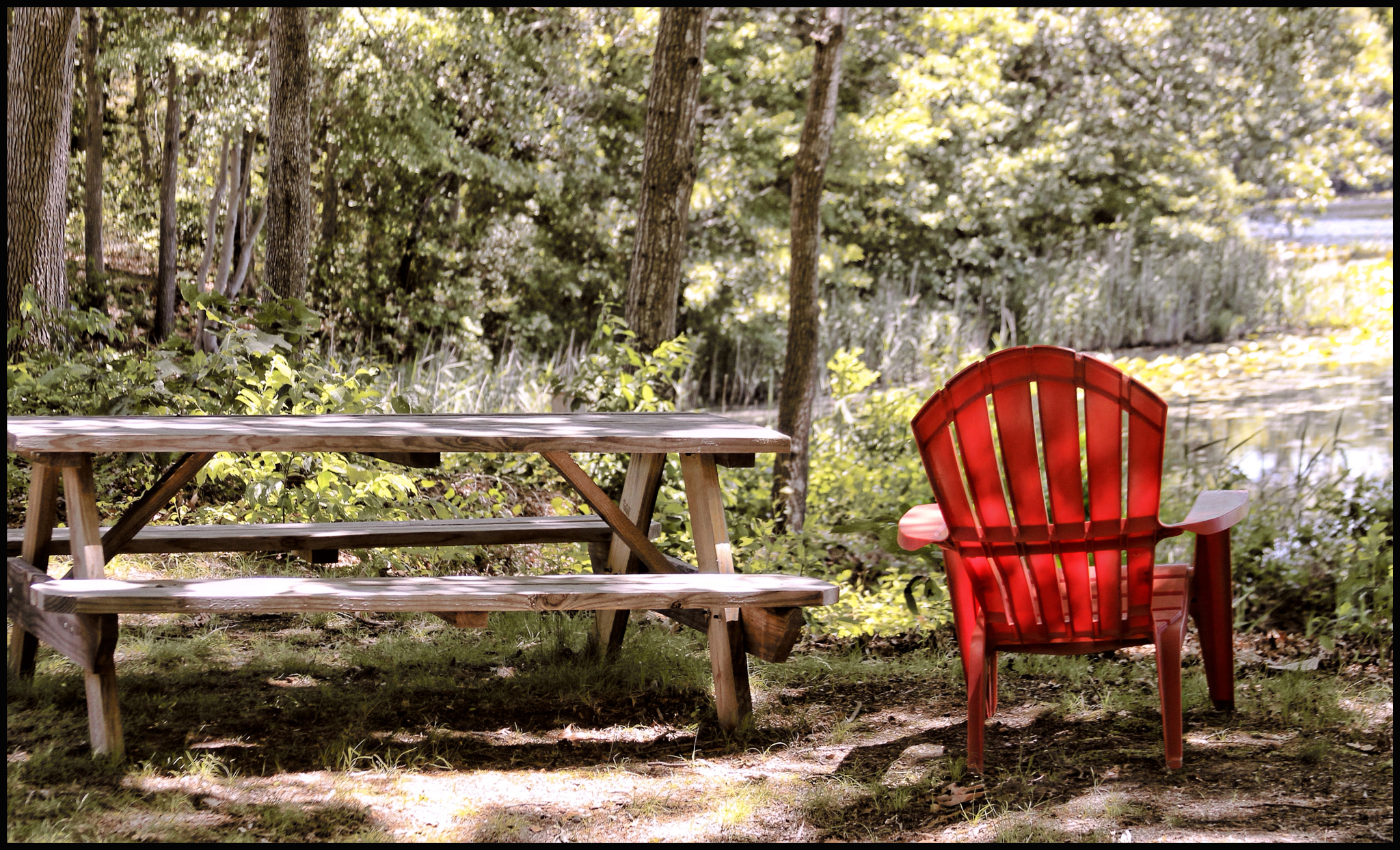 Canon EF 28-135mm F3.5-5.6 IS USM sample photo. Red glowing chair... photography
