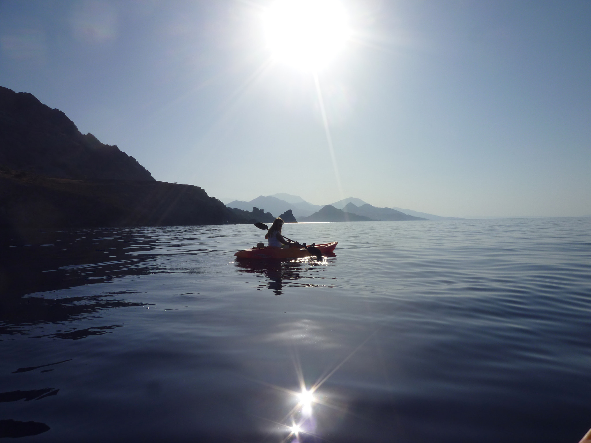 Panasonic DMC-FX60 sample photo. Young lady kayaking early morning, libyan sea photography