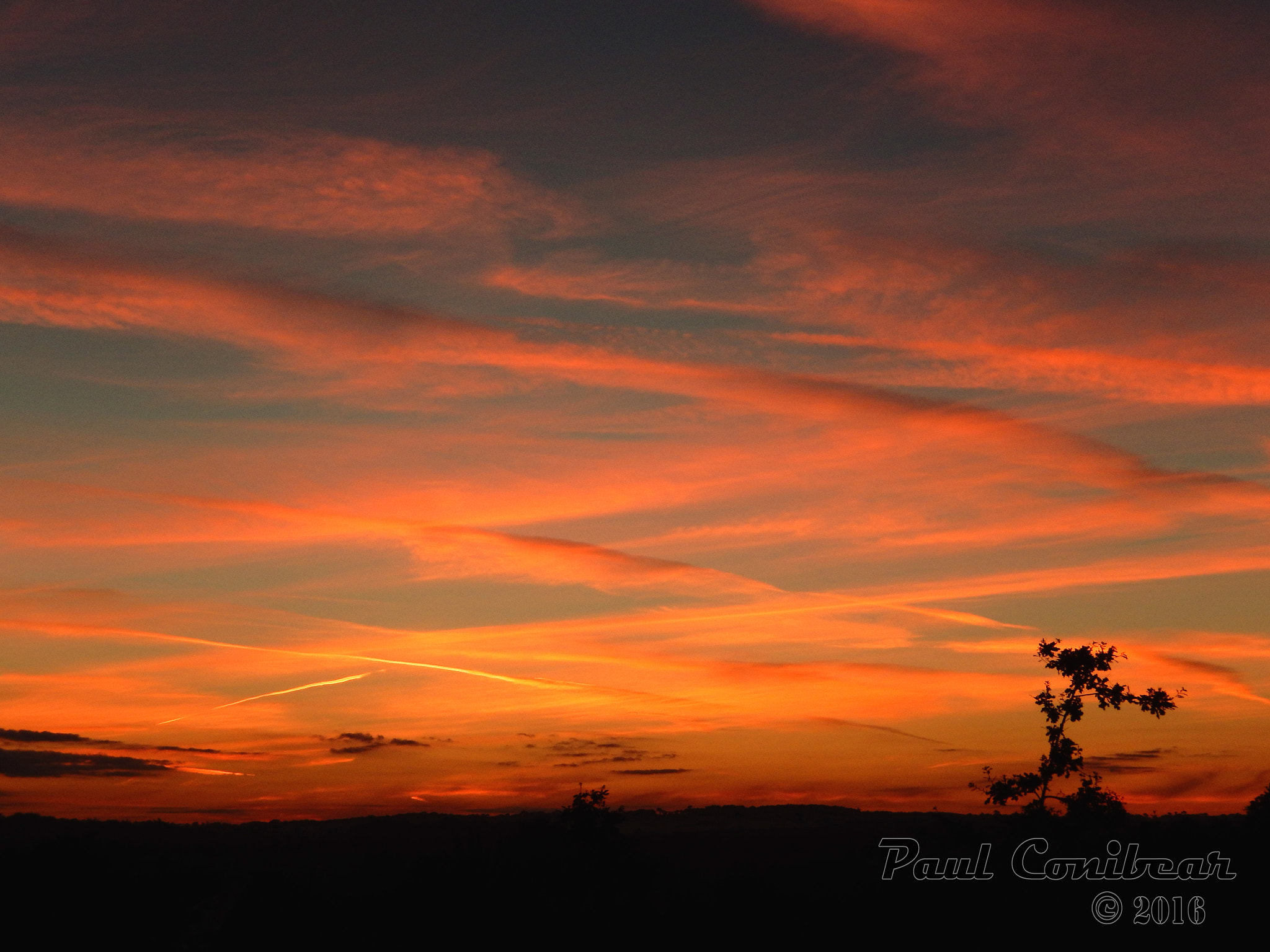 Nikon COOLPIX S9600 sample photo. Con trails sunset photography
