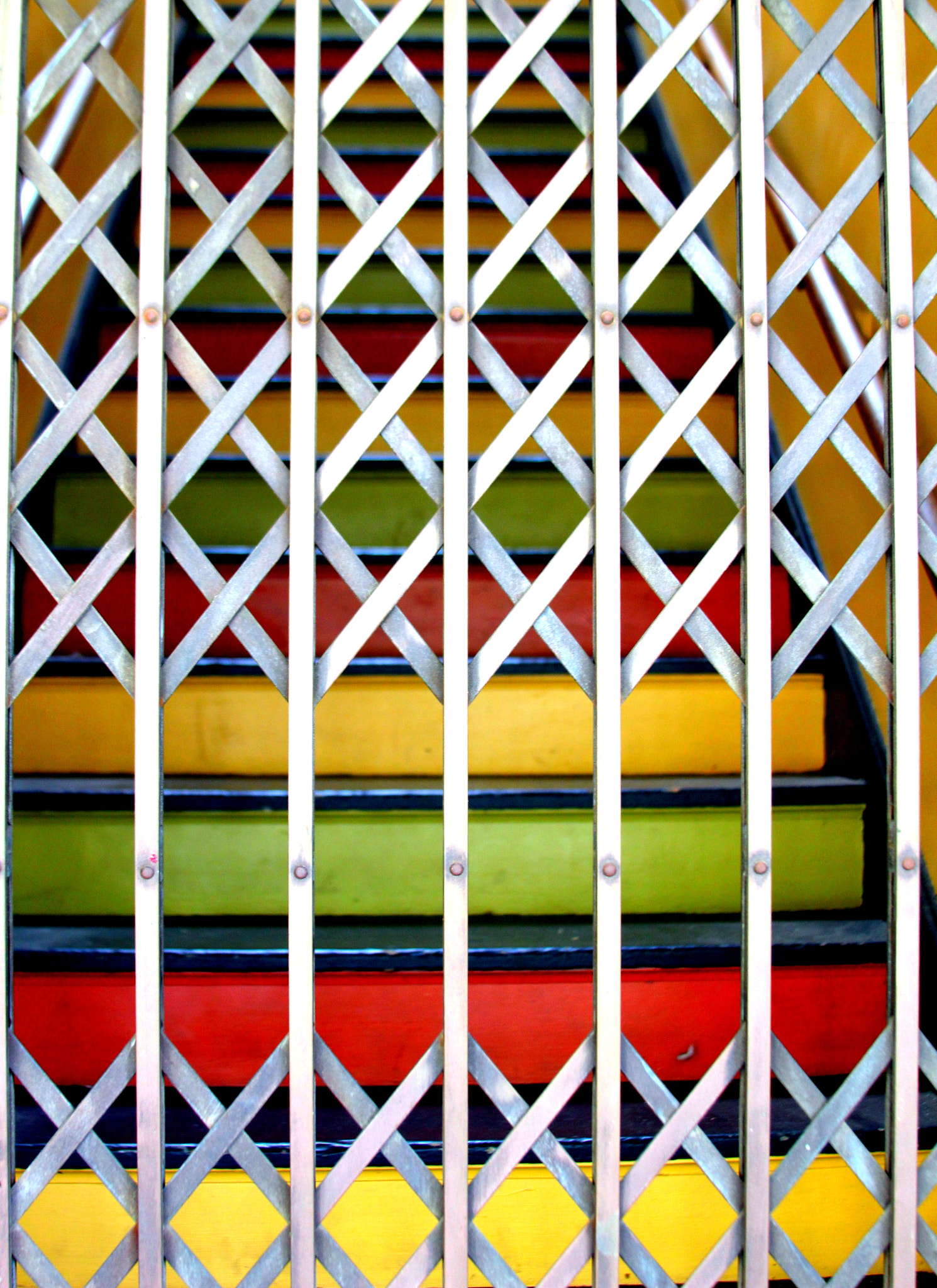 Canon EF 28-135mm F3.5-5.6 IS USM sample photo. Color steps behind the gate photography