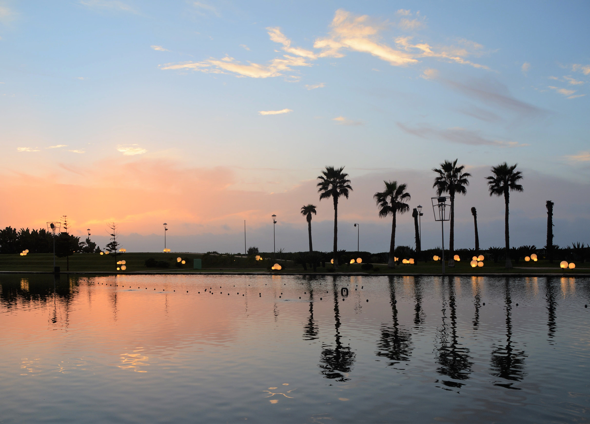 Nikon D7100 + Sigma 18-200mm F3.5-6.3 DC sample photo. Sunset in casablanca  photography