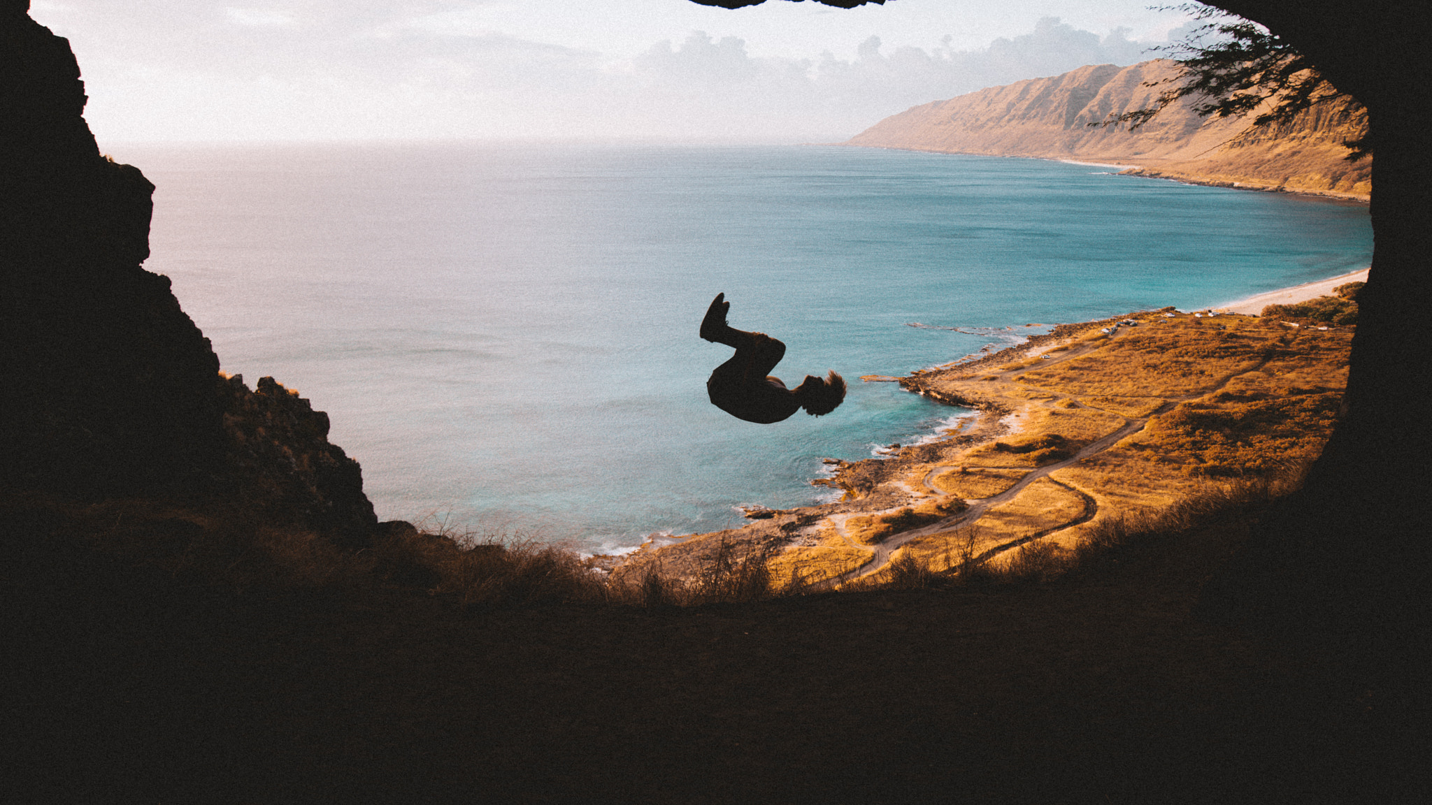 Sony a7R II + Canon EF 24-105mm F4L IS USM sample photo. Working out and flipping while looking down at the beauty of hawaii photography