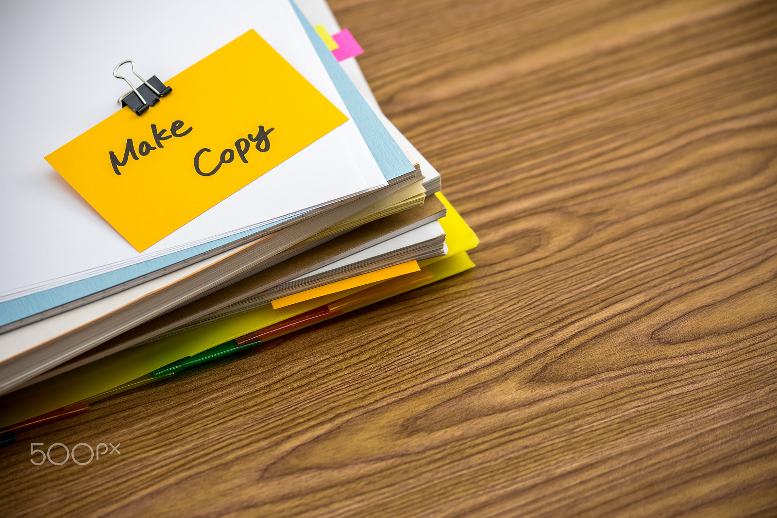 Canon EF-S 55-250mm F4-5.6 IS sample photo. Make copy; the pile of business documents on the desk photography