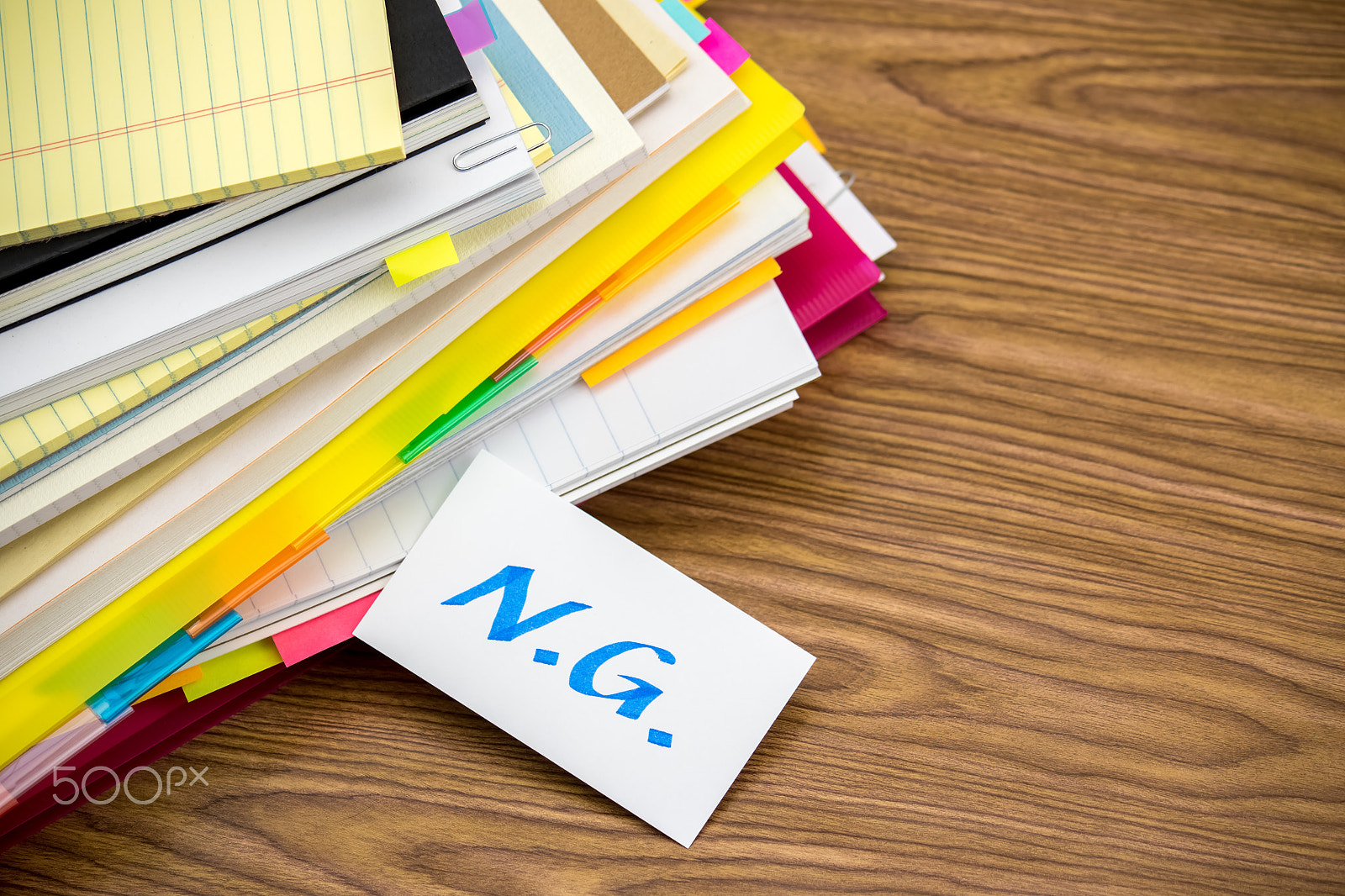 Canon EF-S 55-250mm F4-5.6 IS sample photo. Ng; the pile of business documents on the desk photography