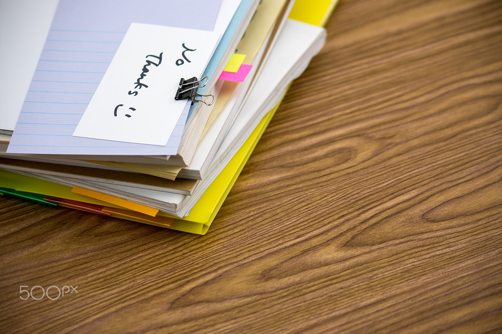 Canon EF-S 55-250mm F4-5.6 IS sample photo. No thanks; the pile of business documents on the desk photography