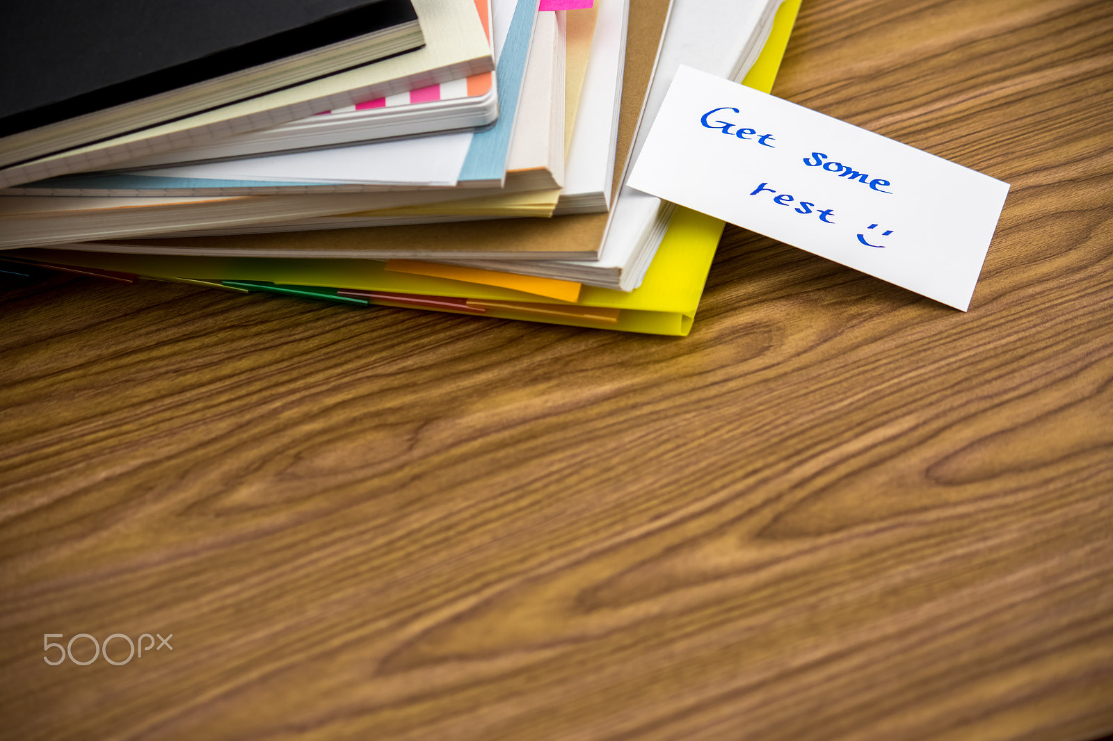 Canon EF-S 55-250mm F4-5.6 IS sample photo. Get some rest; the pile of business documents on the desk photography