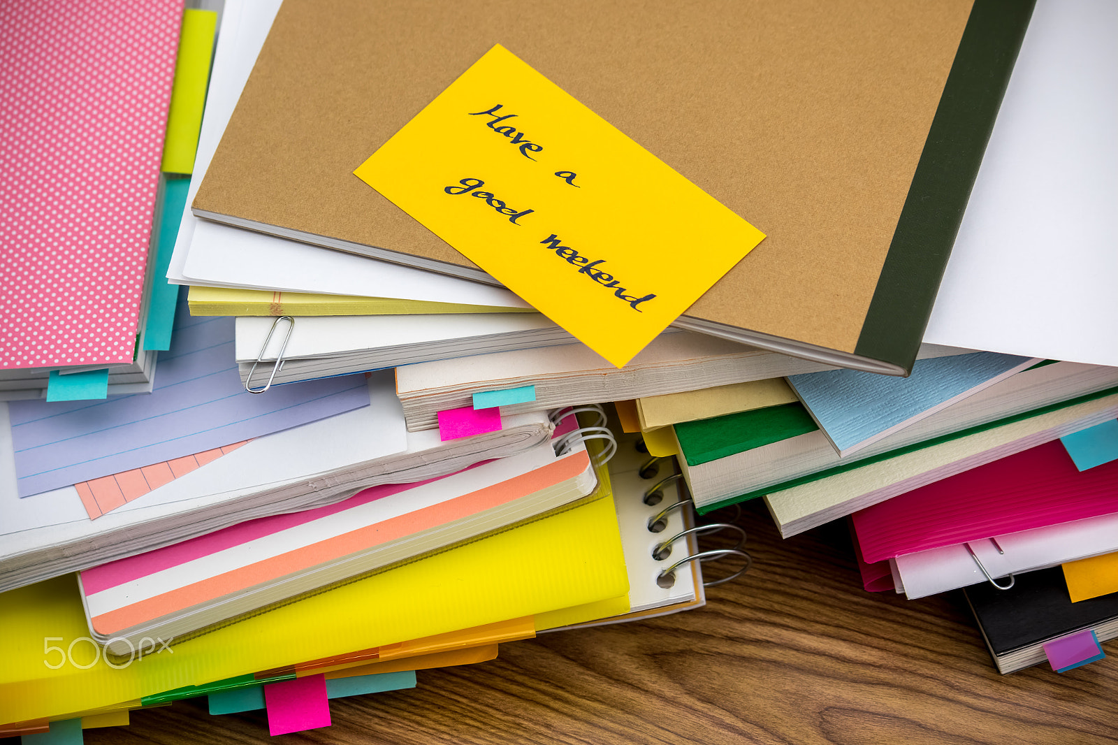 Canon EF-S 55-250mm F4-5.6 IS sample photo. Good weekend; the pile of business documents on the desk photography