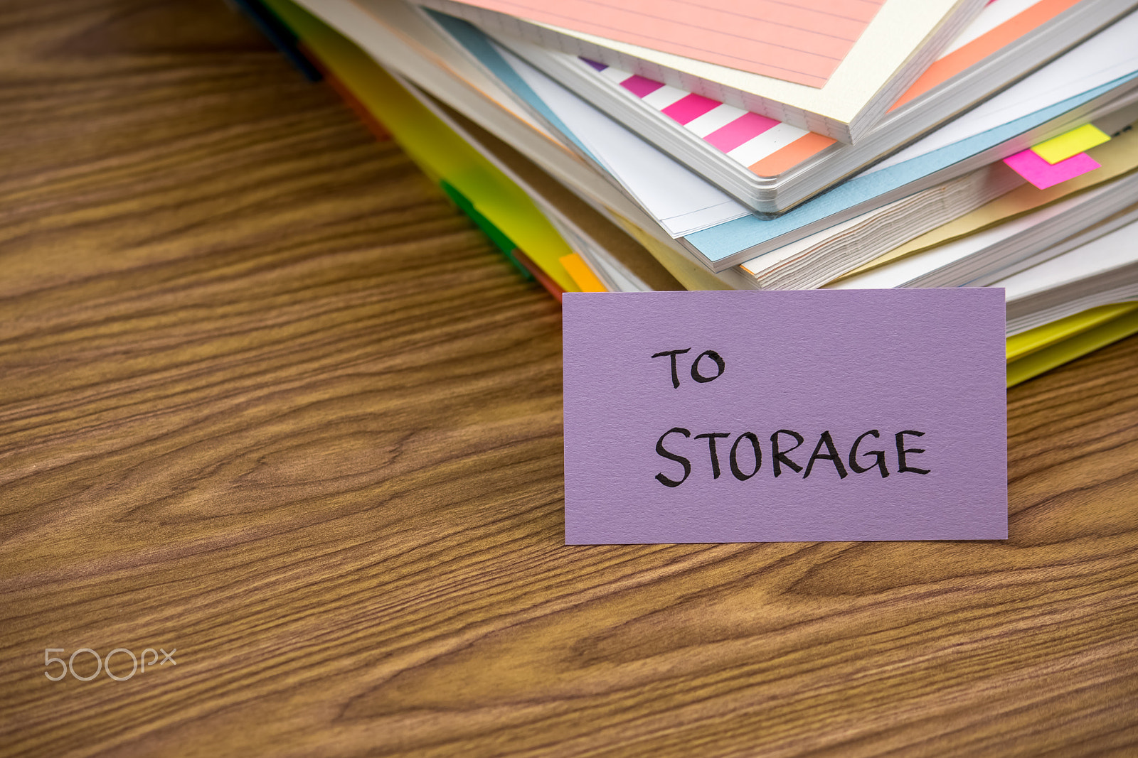 Canon EF-S 55-250mm F4-5.6 IS sample photo. To storage; the pile of business documents on the desk photography
