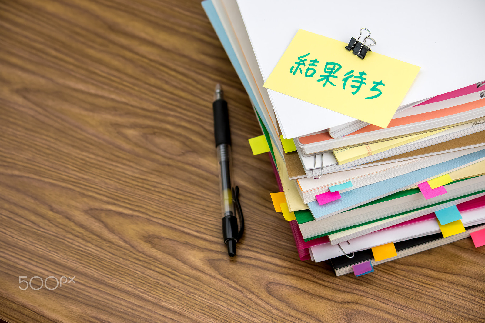 Canon EF-S 55-250mm F4-5.6 IS sample photo. Pending; the pile of business documents on the desk photography