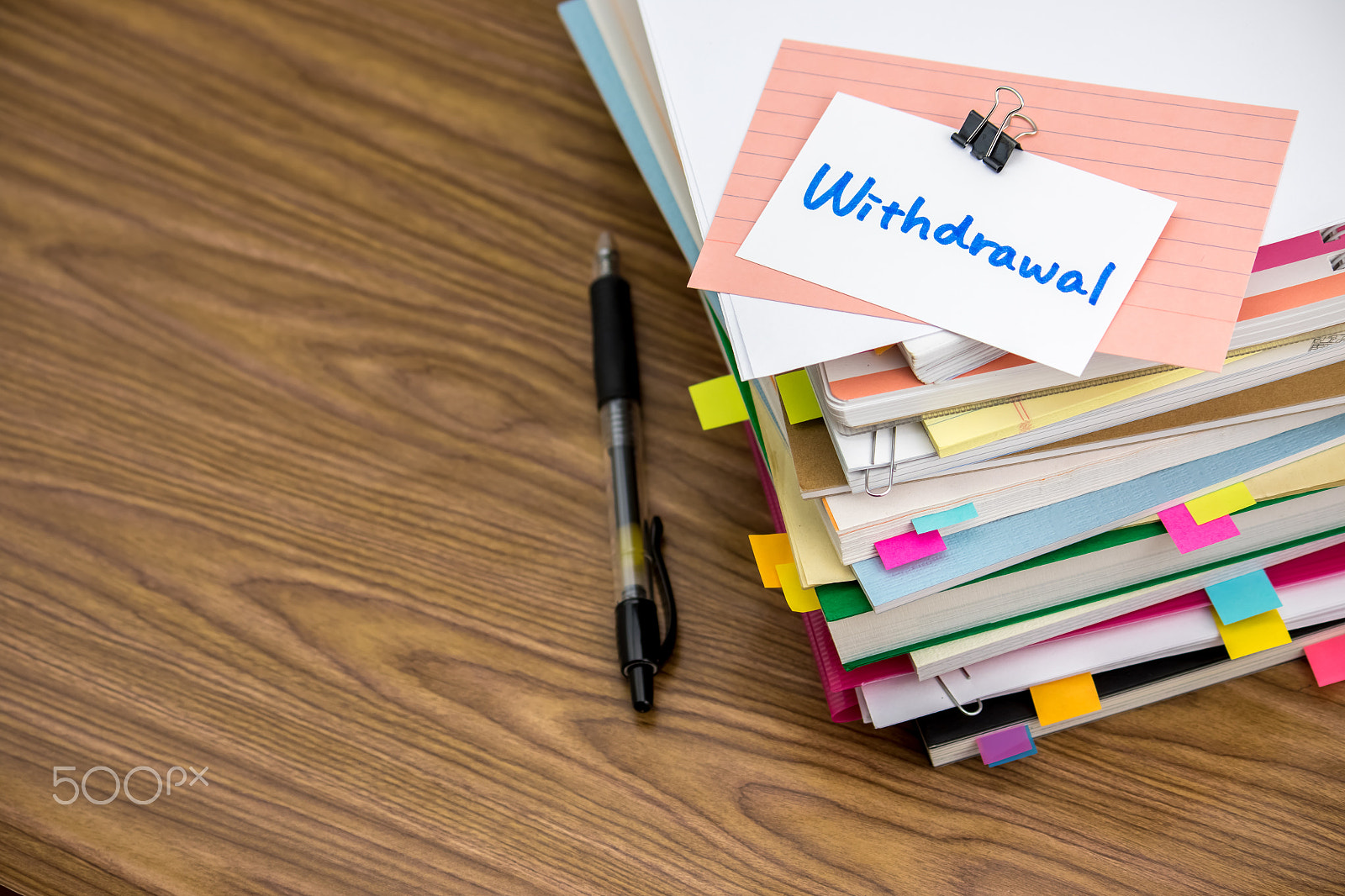 Canon EF-S 55-250mm F4-5.6 IS sample photo. Withdrawal; the pile of business documents on the desk photography