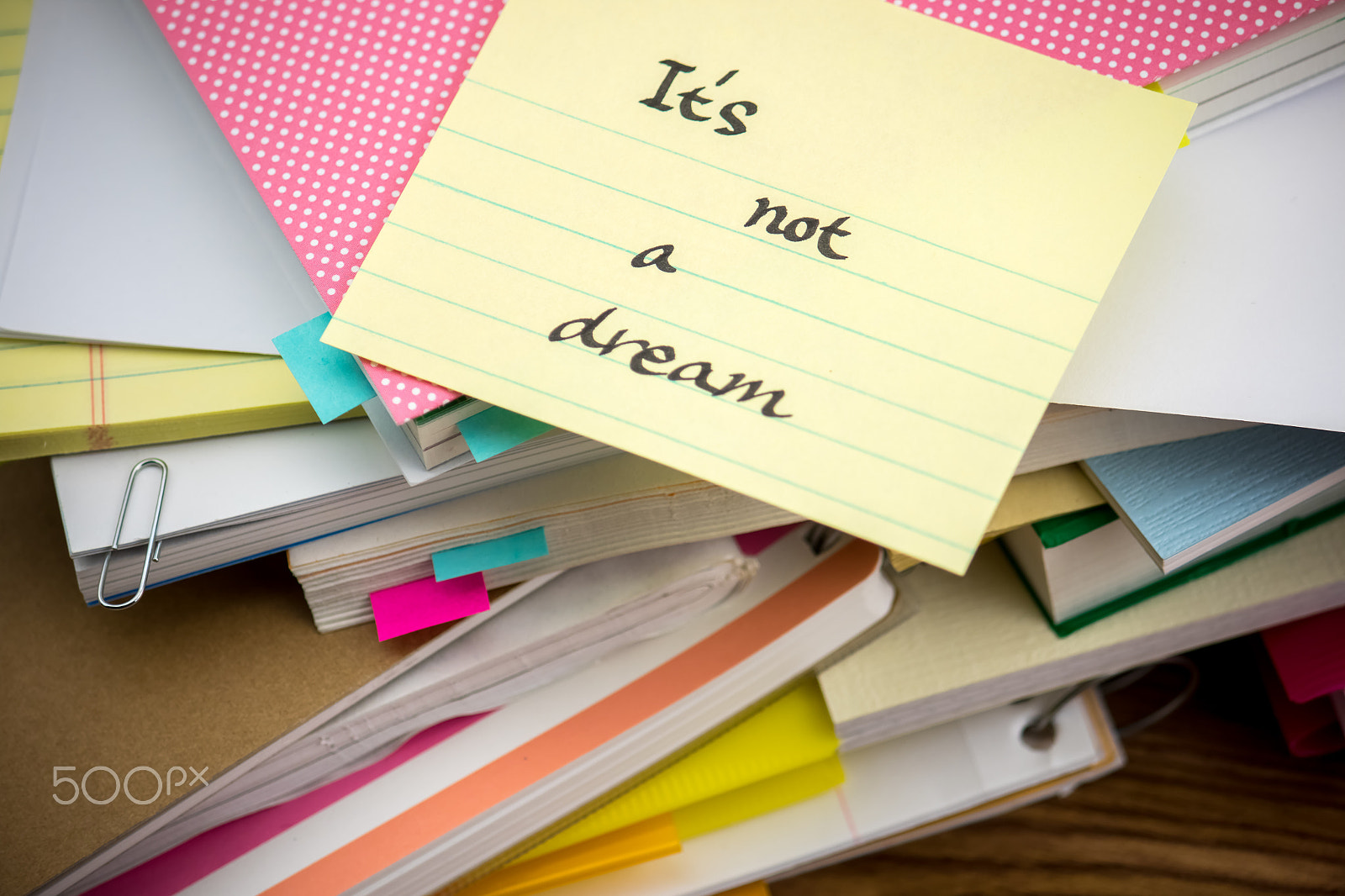 Canon EF-S 55-250mm F4-5.6 IS sample photo. Not a dream; the pile of business documents on the desk photography