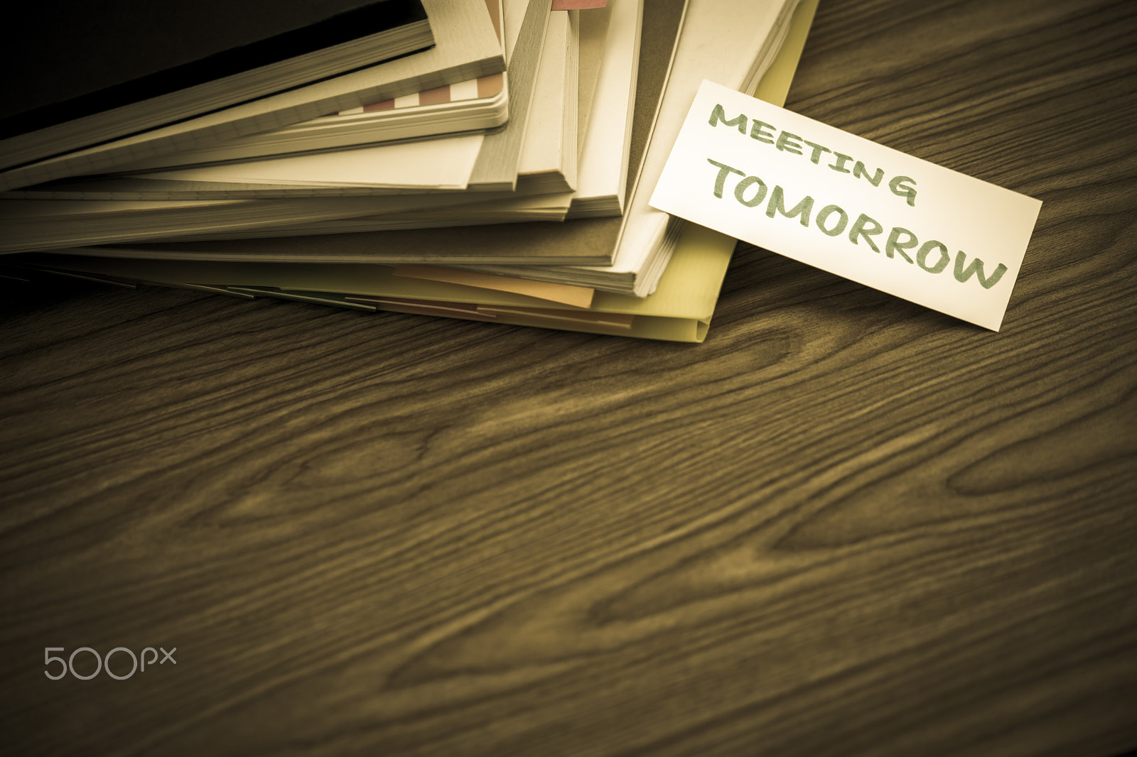 Canon EF-S 55-250mm F4-5.6 IS sample photo. Meeting tomorrow; the pile of business documents on the desk photography