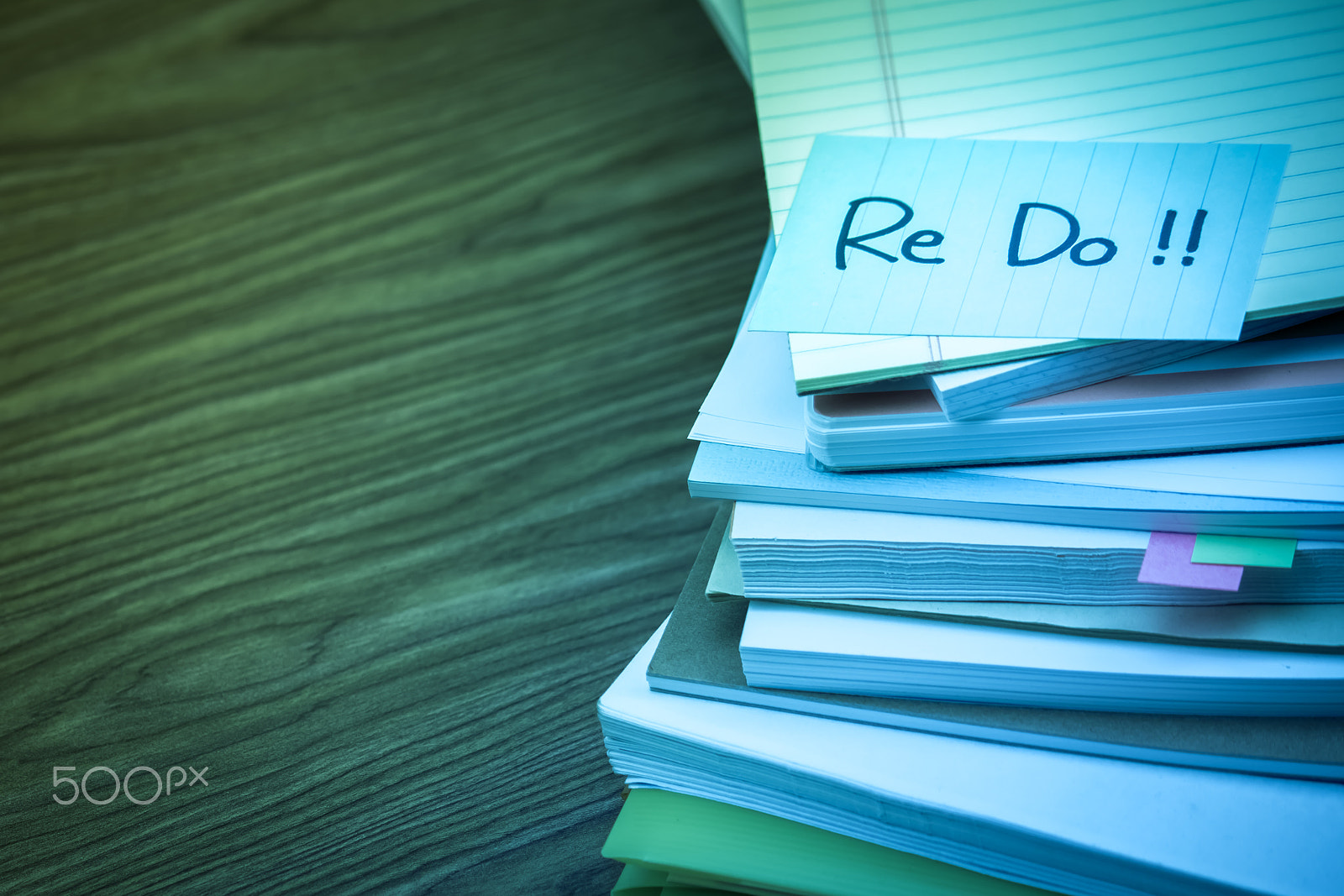 Canon EF-S 55-250mm F4-5.6 IS sample photo. Redo; the pile of business documents on the desk photography