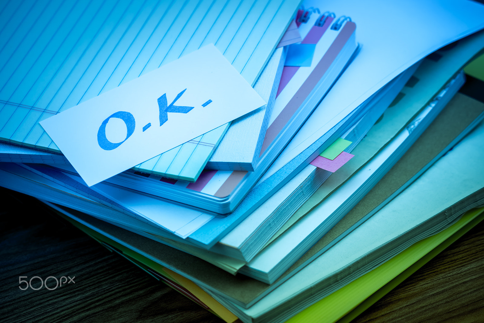Canon EF-S 55-250mm F4-5.6 IS sample photo. Ok; the pile of business documents on the desk photography