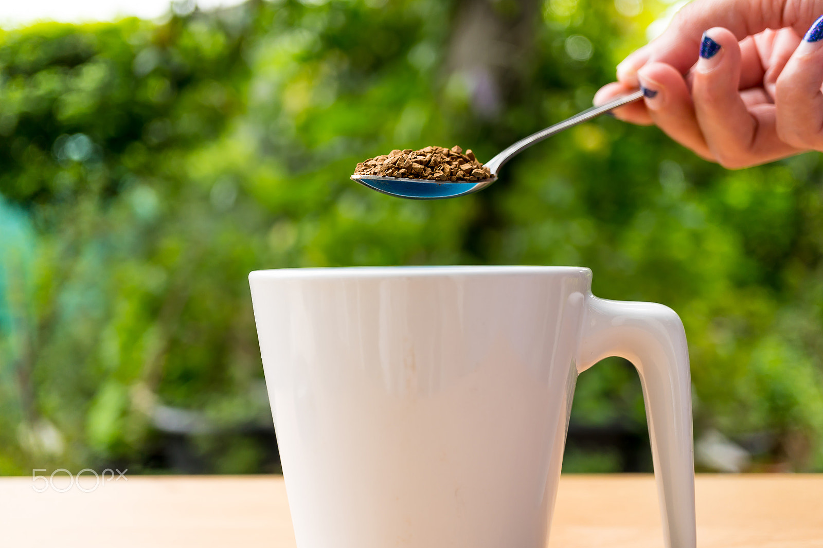 Sony a6300 + Sony E 30mm F3.5 Macro sample photo. Hand with spoon put coffee in a cup photography