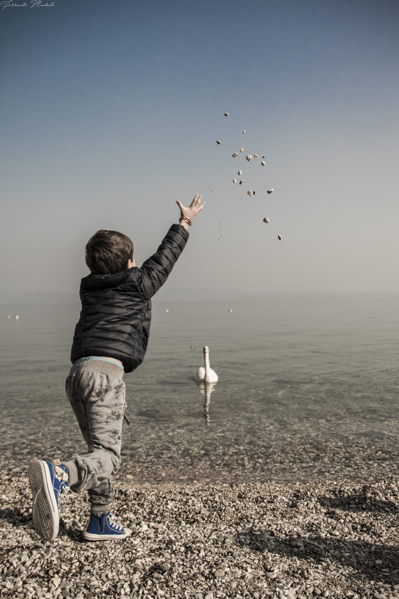 Canon EOS 760D (EOS Rebel T6s / EOS 8000D) sample photo. Throwing stones in the lake photography