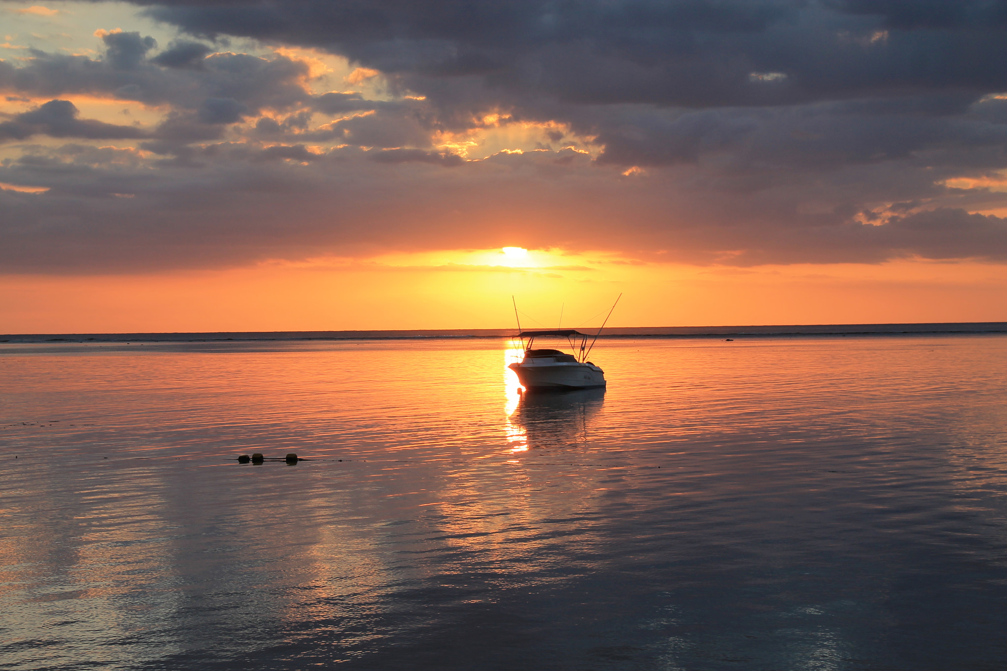 Sigma 18-250mm F3.5-6.3 DC OS HSM sample photo. A boat in the sea photography