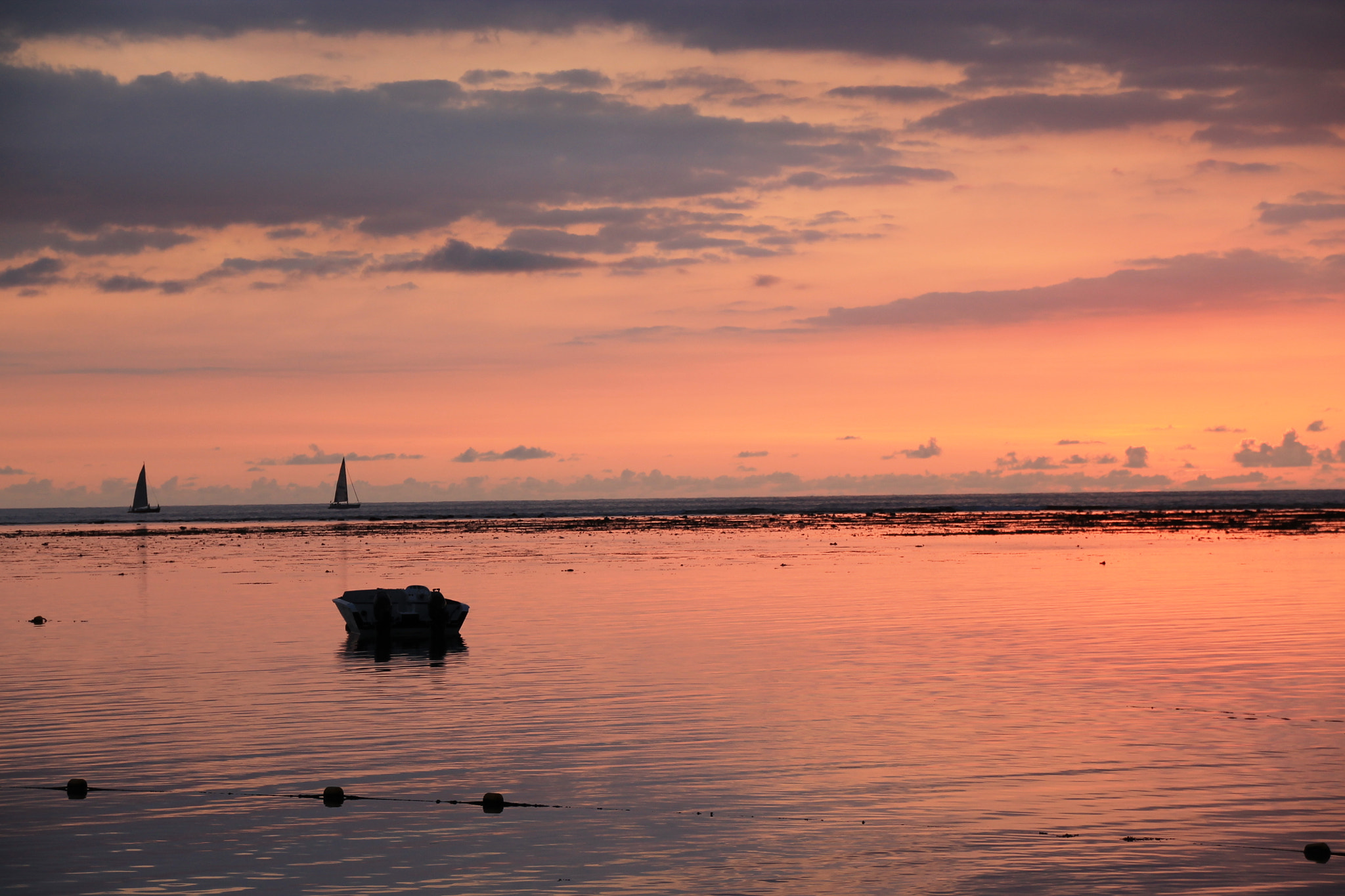 Sigma 18-250mm F3.5-6.3 DC OS HSM sample photo. Boats in pink sky photography