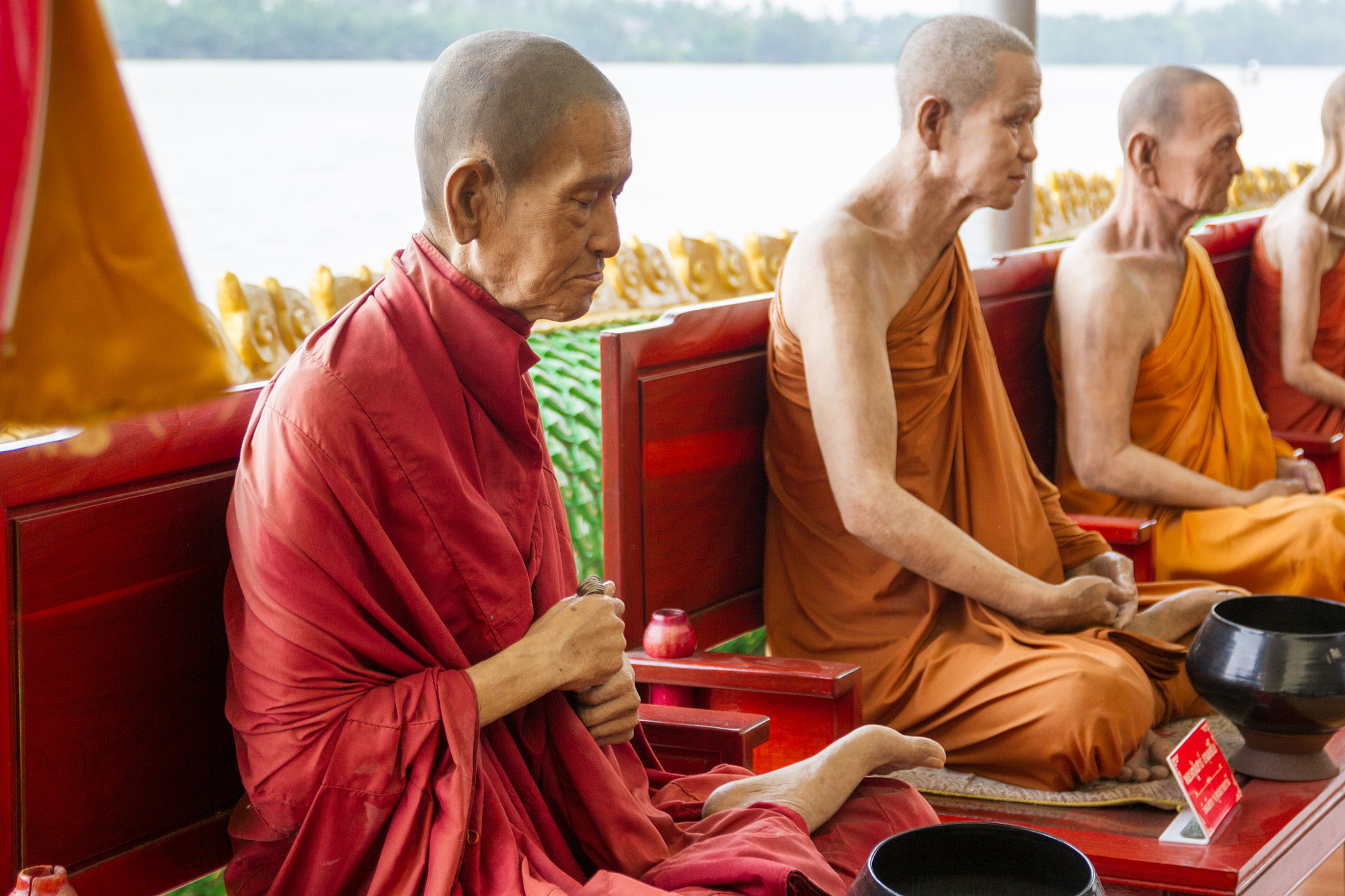 Sigma 17-70mm F2.8-4 DC Macro OS HSM sample photo. Wax figures monk photography