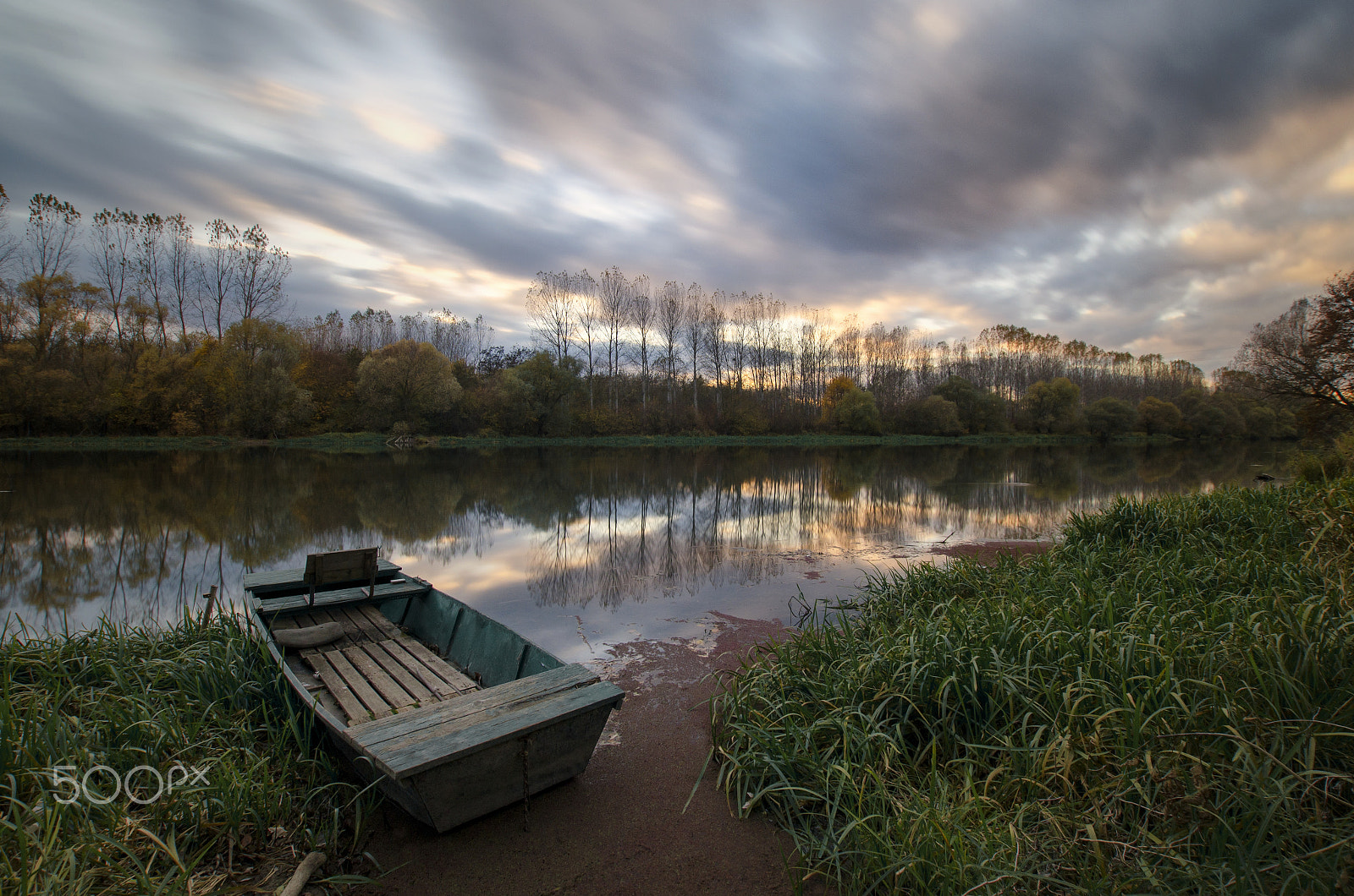 Nikon D5100 + Sigma 10-20mm F3.5 EX DC HSM sample photo. Boat at sunset photography