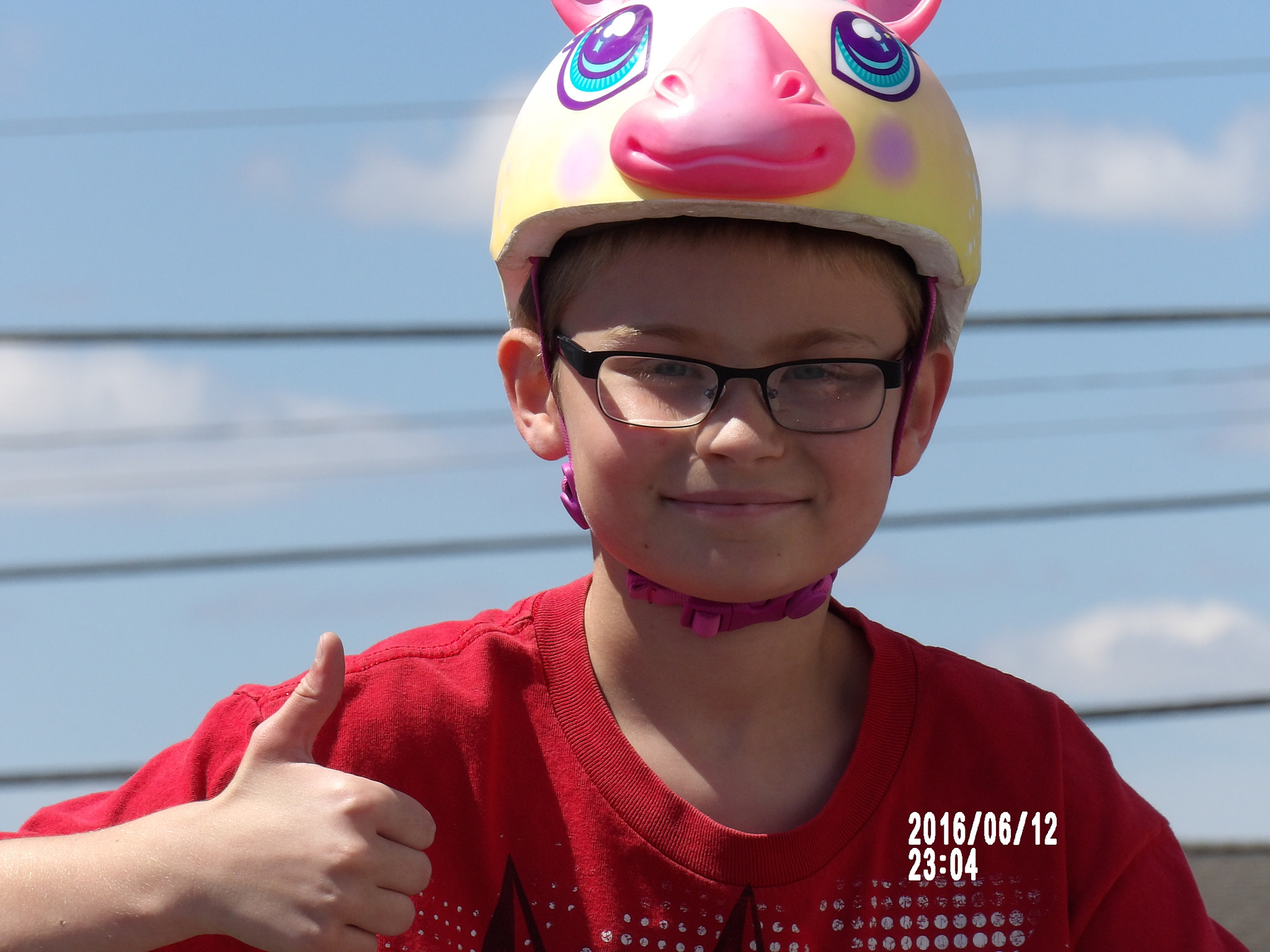Ricoh PENTAX XG-1 sample photo. My cousin put on my sister's bicycle helmet <3 photography
