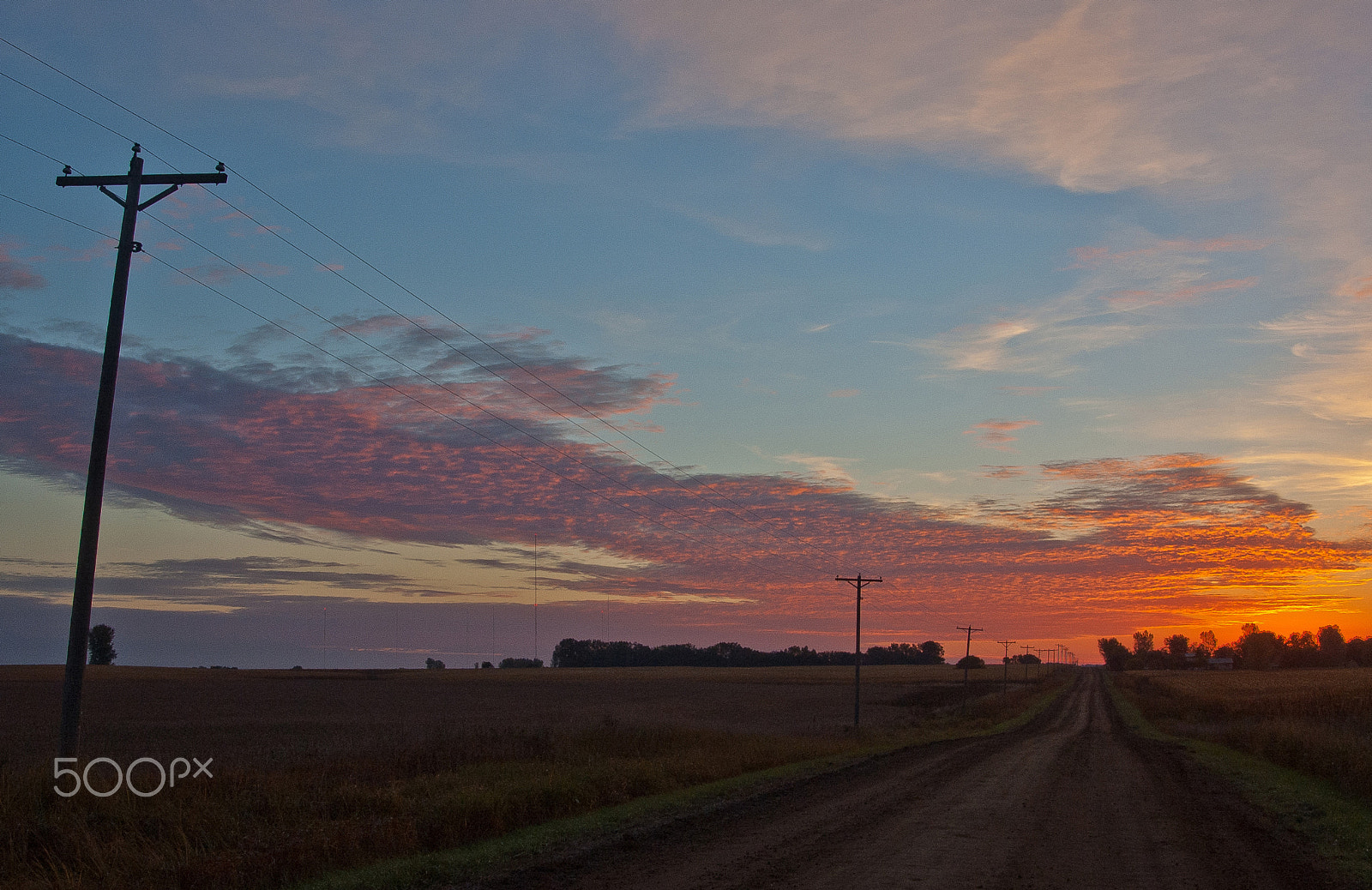 AF Zoom-Nikkor 28-80mm f/3.5-5.6D sample photo. Sunrise over county road photography