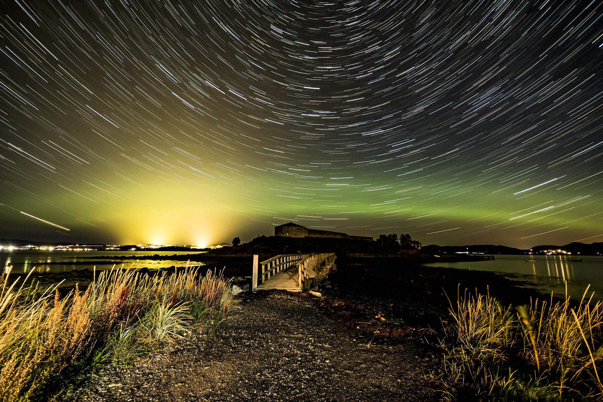 Olympus PEN-F + Panasonic Lumix G Vario 7-14mm F4 ASPH sample photo. Startrails and northern lights photography