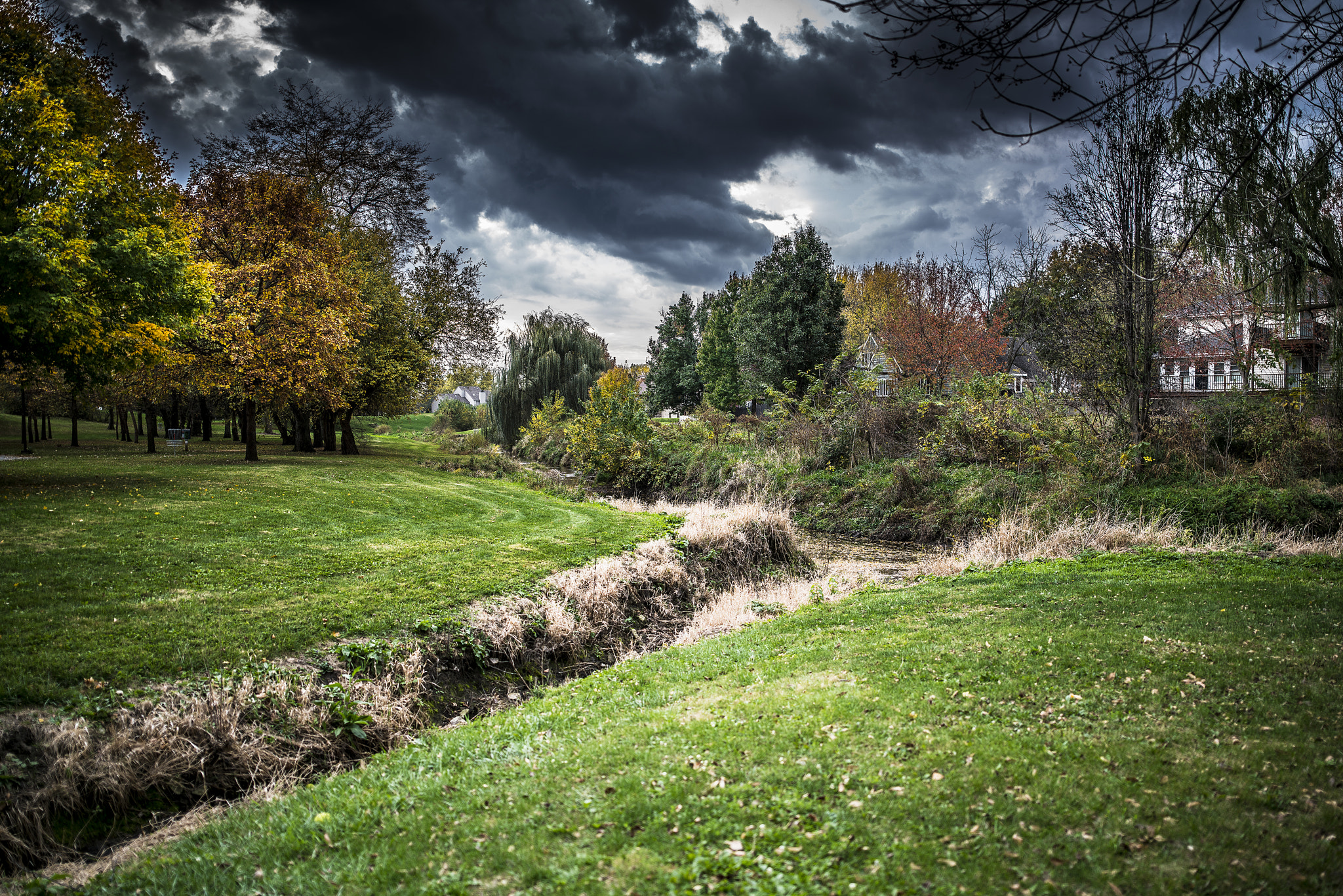 Sony a7R II sample photo. Storm clouds over serene landscape photography