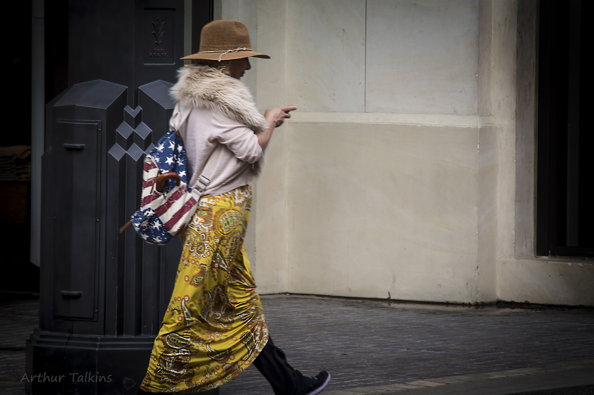 Pentax K-1 sample photo. Fashionista.......big strides...the texting game. photography