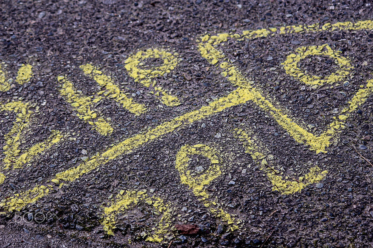 Canon EOS 100D (EOS Rebel SL1 / EOS Kiss X7) sample photo. Grafitti on pavement photography