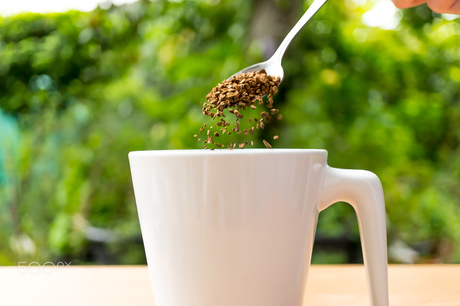 Sony a6300 sample photo. Hand with spoon put coffee in a cup photography