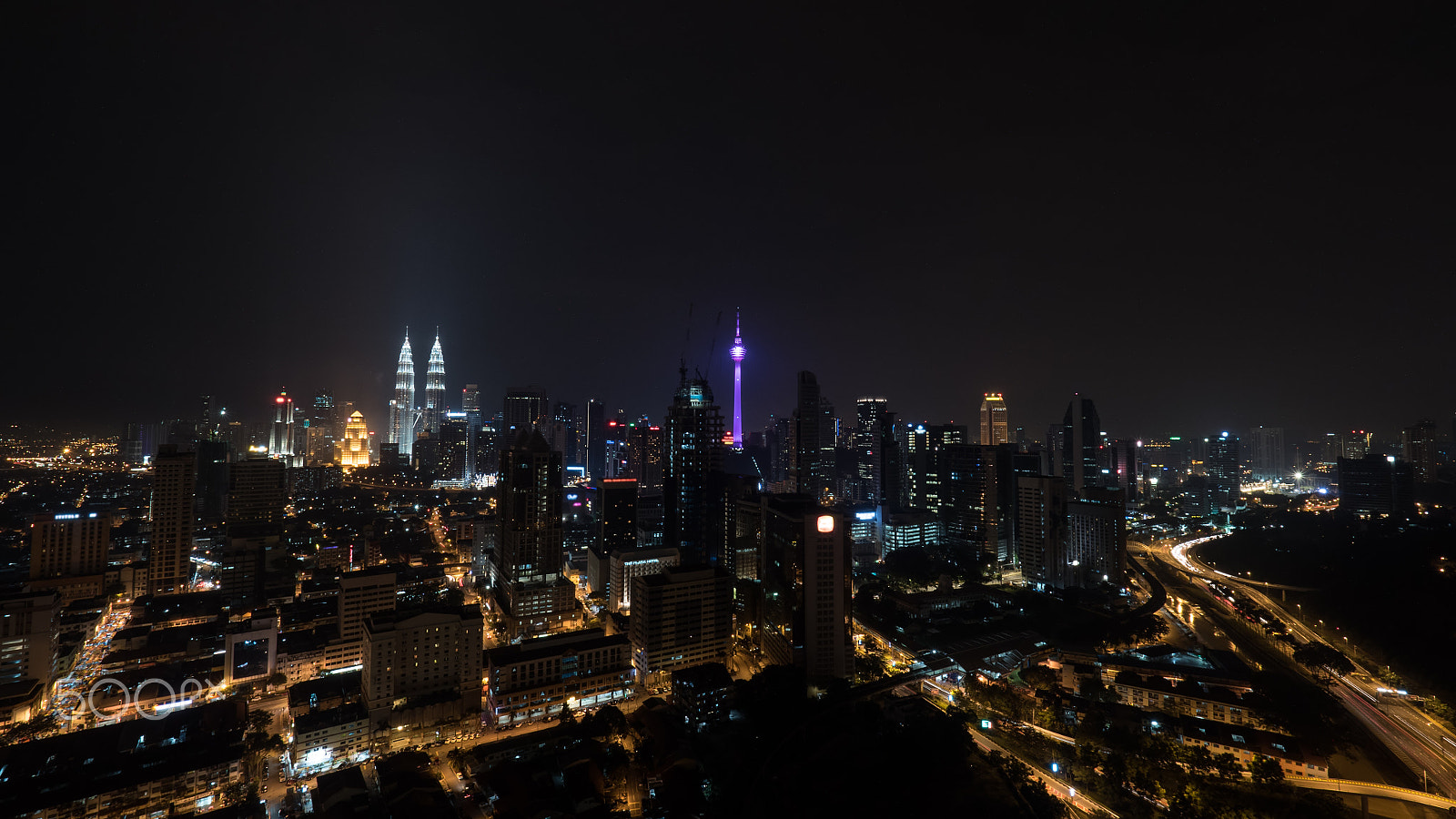 Panasonic Lumix DMC-GH4 + Olympus M.Zuiko Digital ED 7-14mm F2.8 PRO sample photo. Night illuminated kuala lumpur, malaysia photography