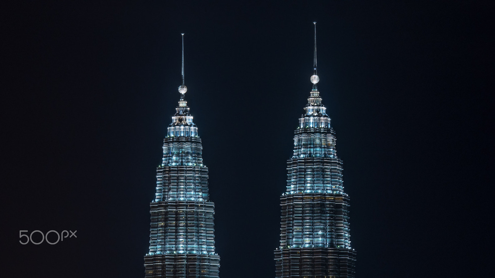 Panasonic Lumix DMC-GH4 sample photo. Illuminated petronas twin towers, kuala lumpur photography