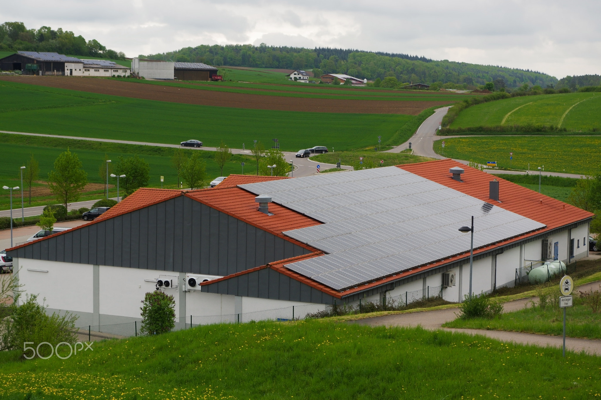 house with solar panels landscape view