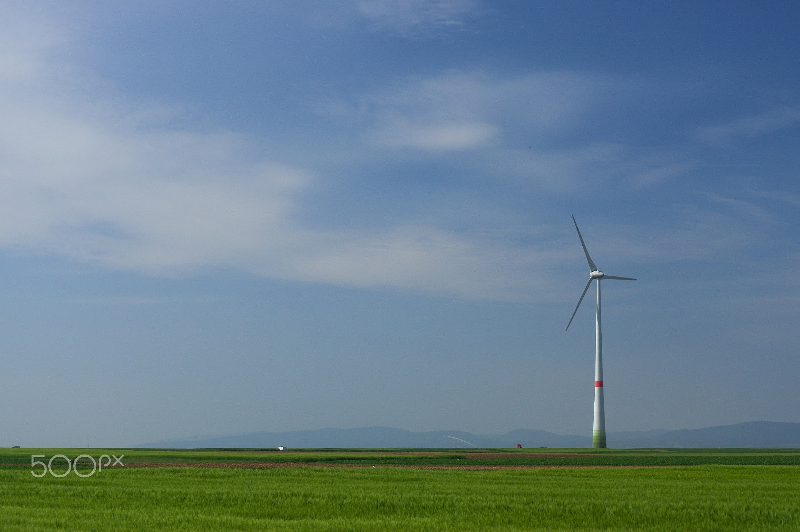 Pentax K-3 sample photo. Green meadow with wind turbines generating electricity photography
